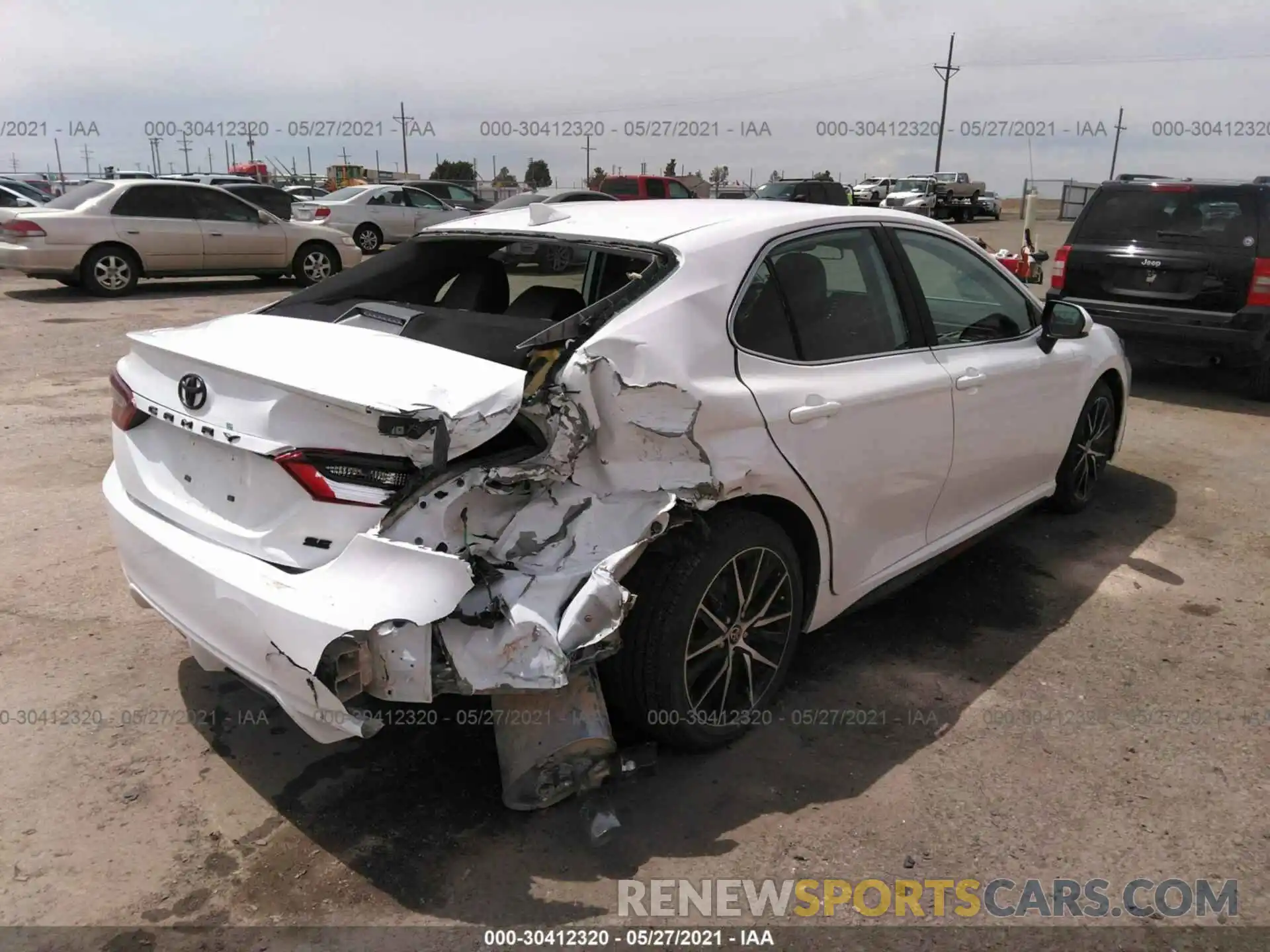 4 Photograph of a damaged car 4T1G11AK8MU556715 TOYOTA CAMRY 2021