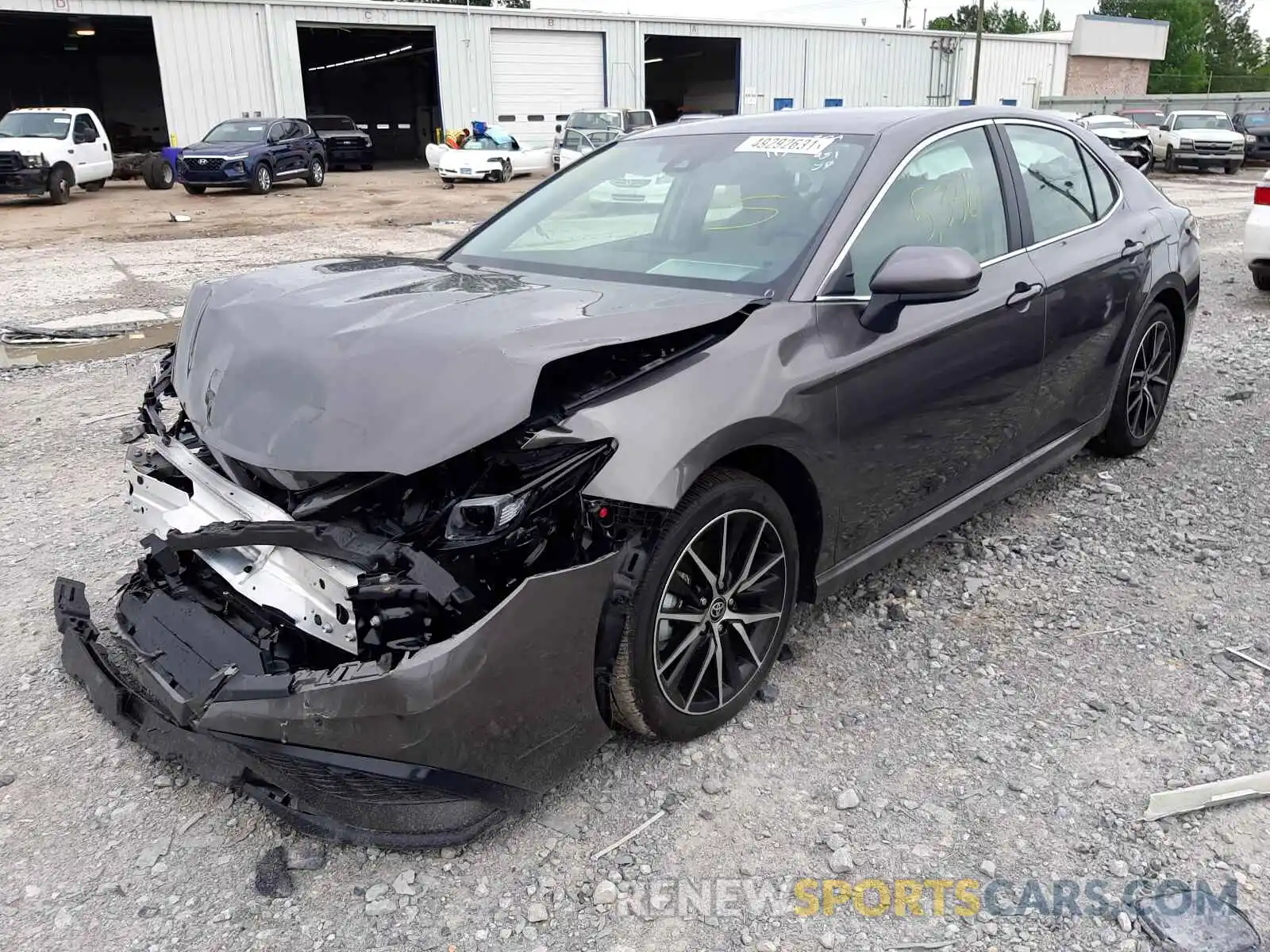 2 Photograph of a damaged car 4T1G11AK8MU566919 TOYOTA CAMRY 2021