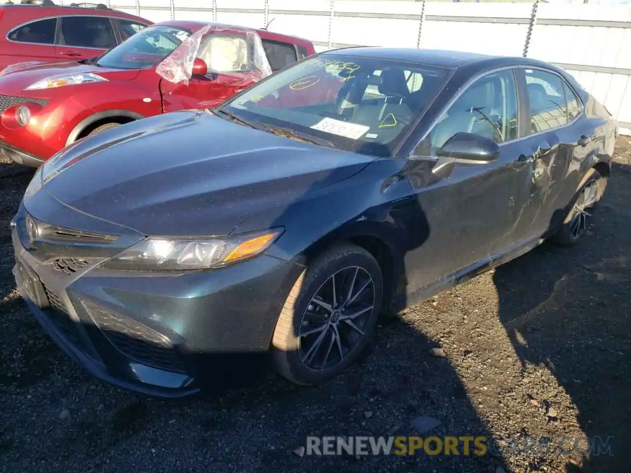 2 Photograph of a damaged car 4T1G11AK8MU585003 TOYOTA CAMRY 2021