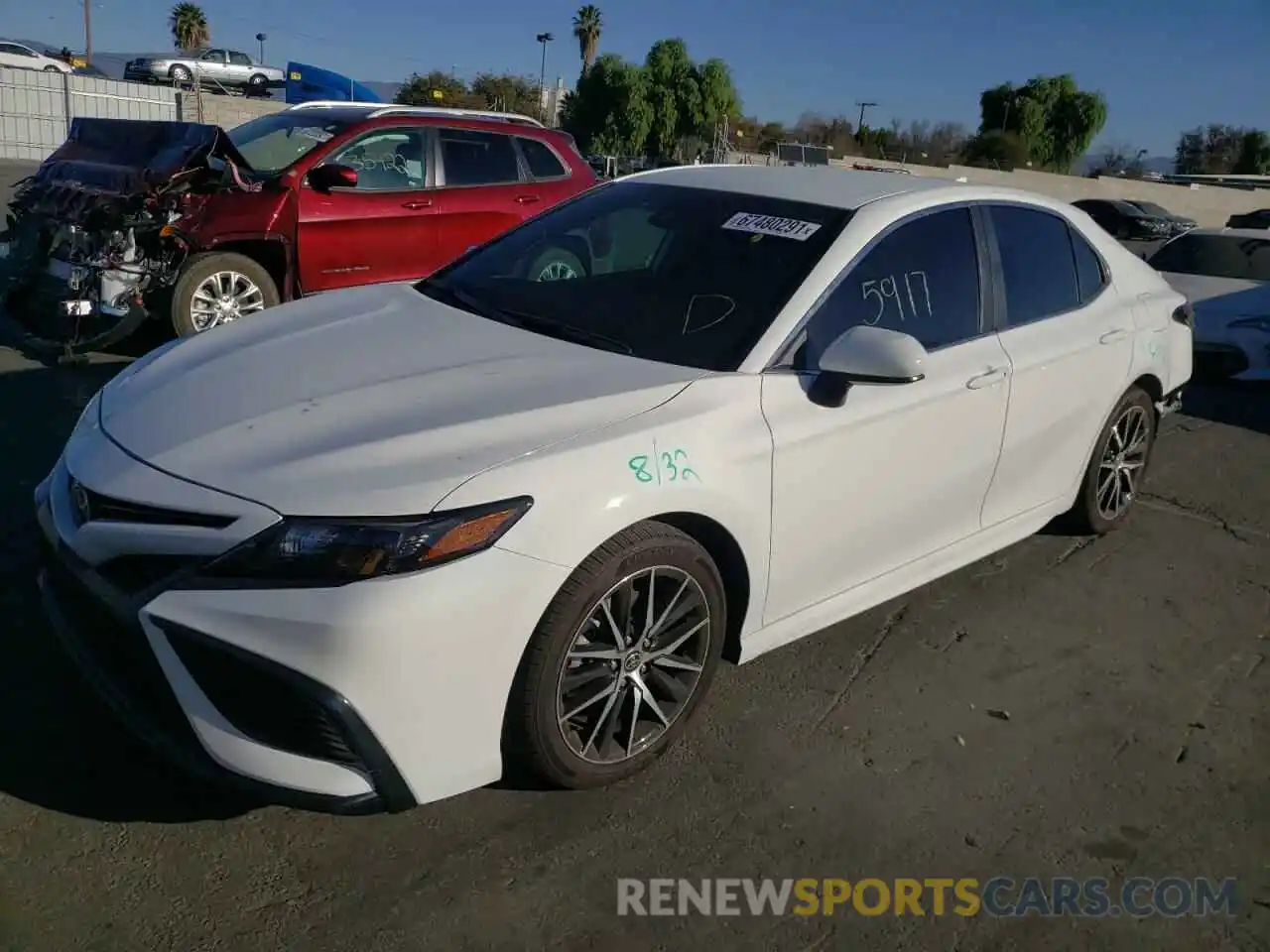 2 Photograph of a damaged car 4T1G11AK8MU601782 TOYOTA CAMRY 2021