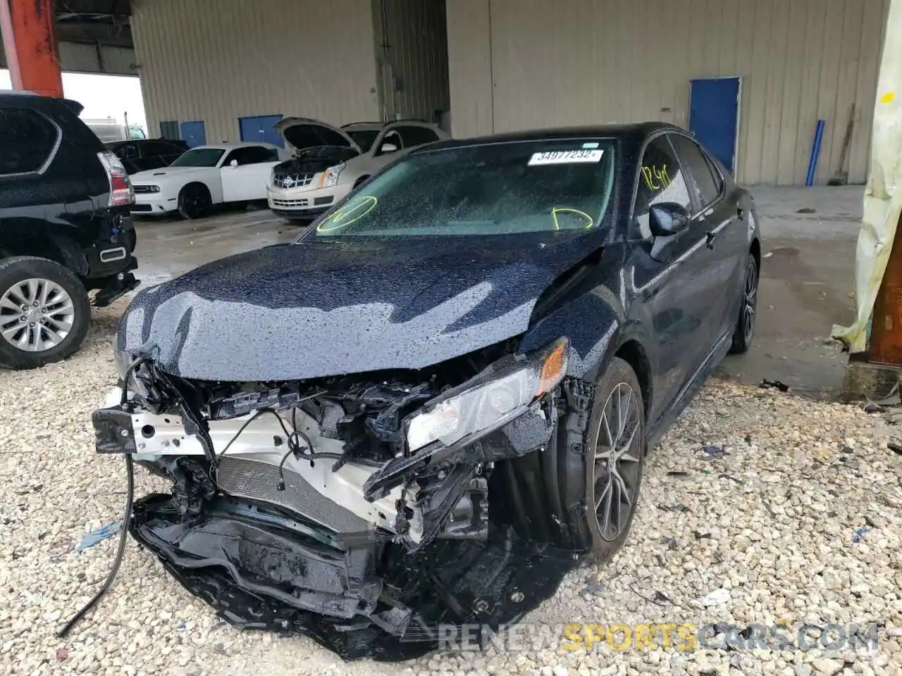 2 Photograph of a damaged car 4T1G11AK8MU605038 TOYOTA CAMRY 2021