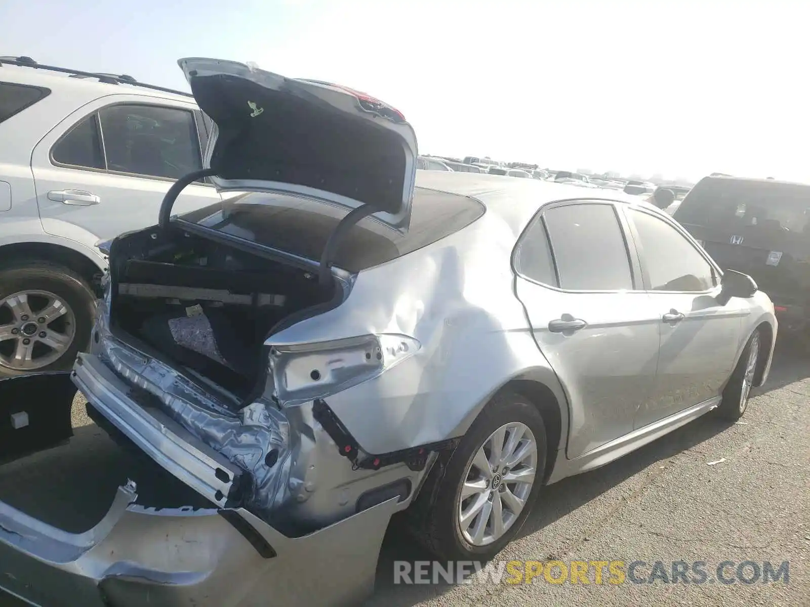 4 Photograph of a damaged car 4T1G11AK9MU403065 TOYOTA CAMRY 2021