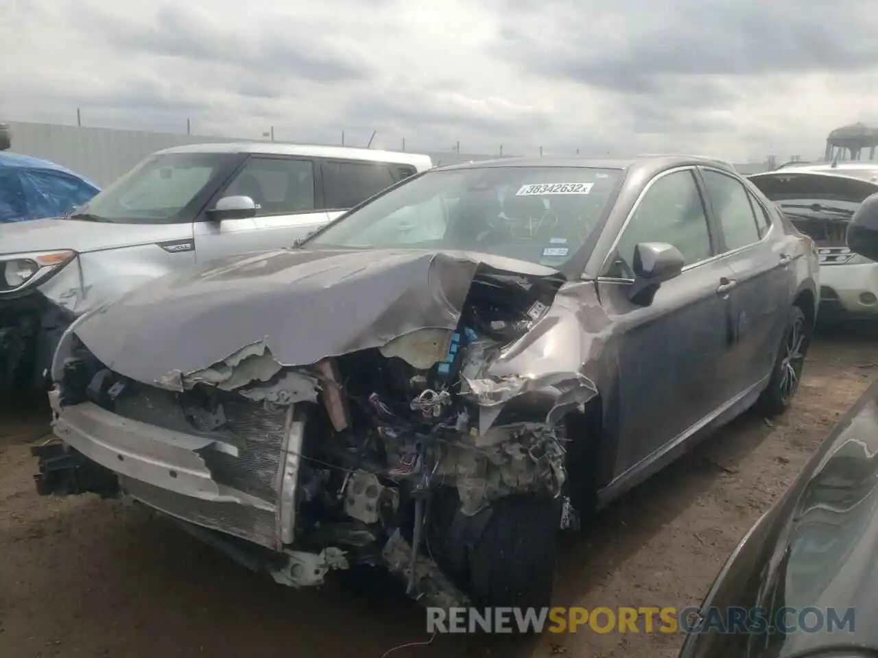 2 Photograph of a damaged car 4T1G11AK9MU415426 TOYOTA CAMRY 2021