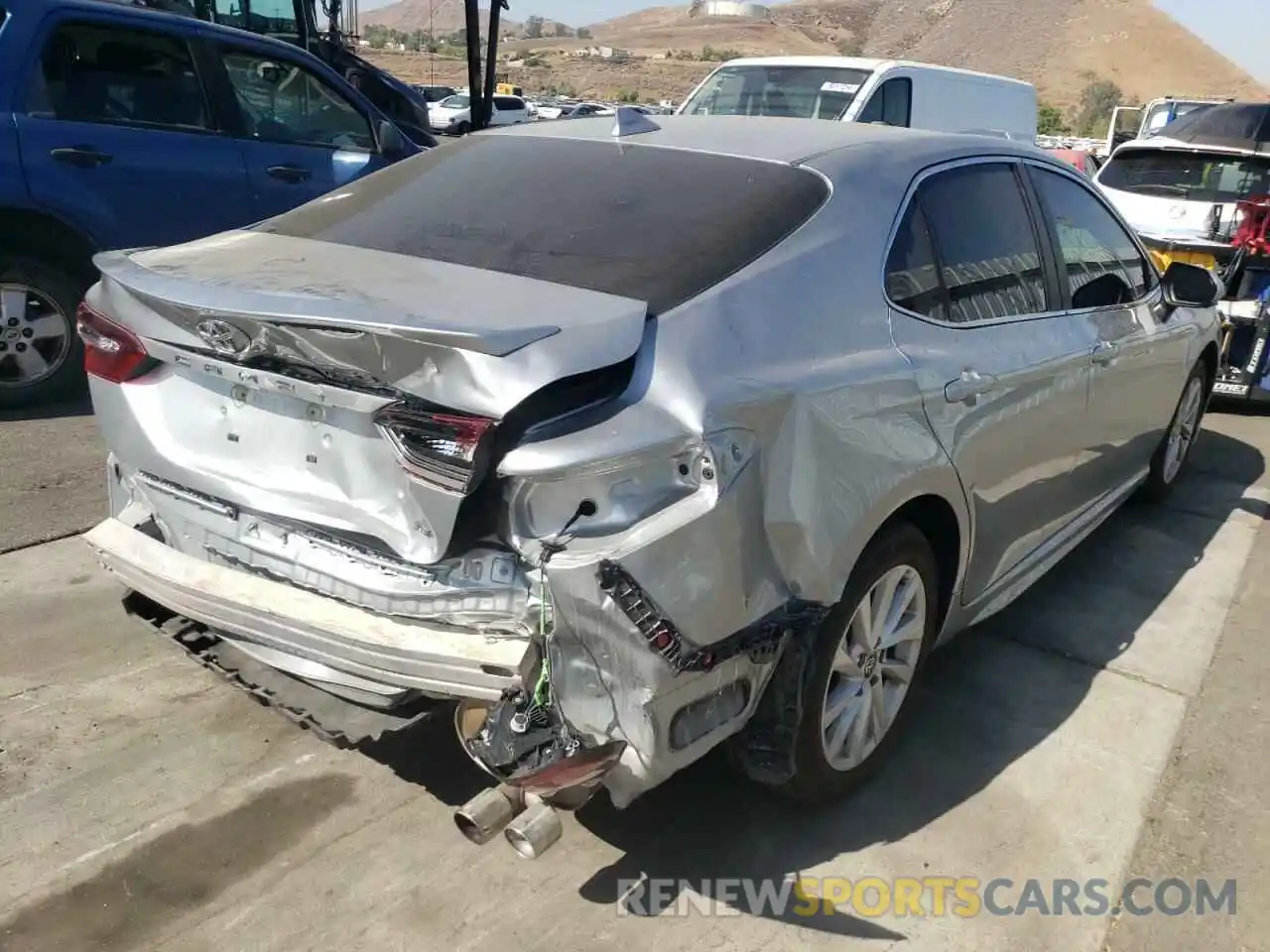 4 Photograph of a damaged car 4T1G11AK9MU425650 TOYOTA CAMRY 2021