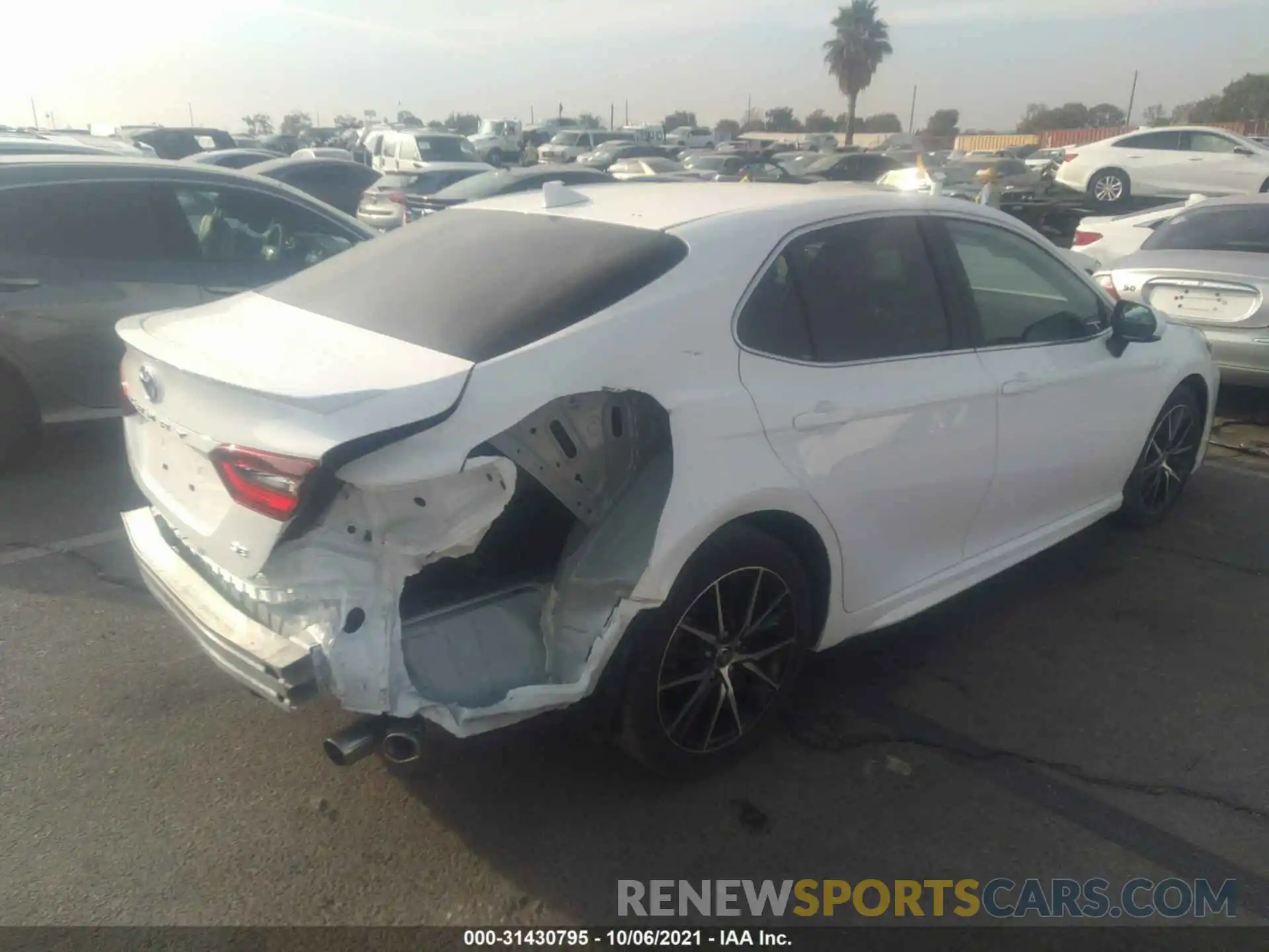 4 Photograph of a damaged car 4T1G11AK9MU428063 TOYOTA CAMRY 2021