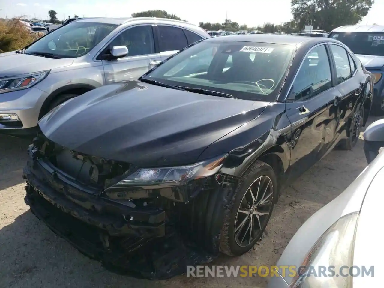 2 Photograph of a damaged car 4T1G11AK9MU530155 TOYOTA CAMRY 2021