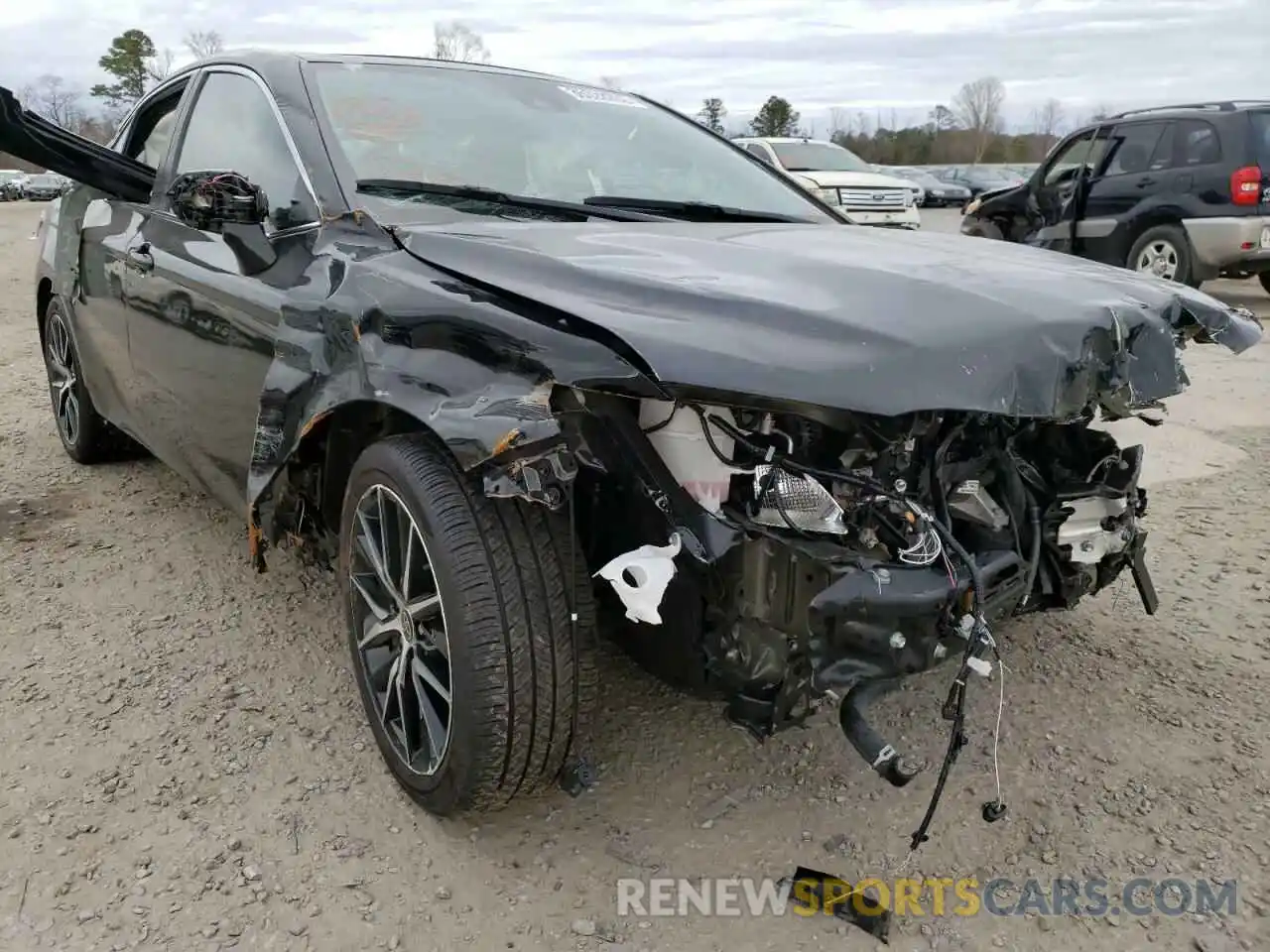 1 Photograph of a damaged car 4T1G11AK9MU556013 TOYOTA CAMRY 2021