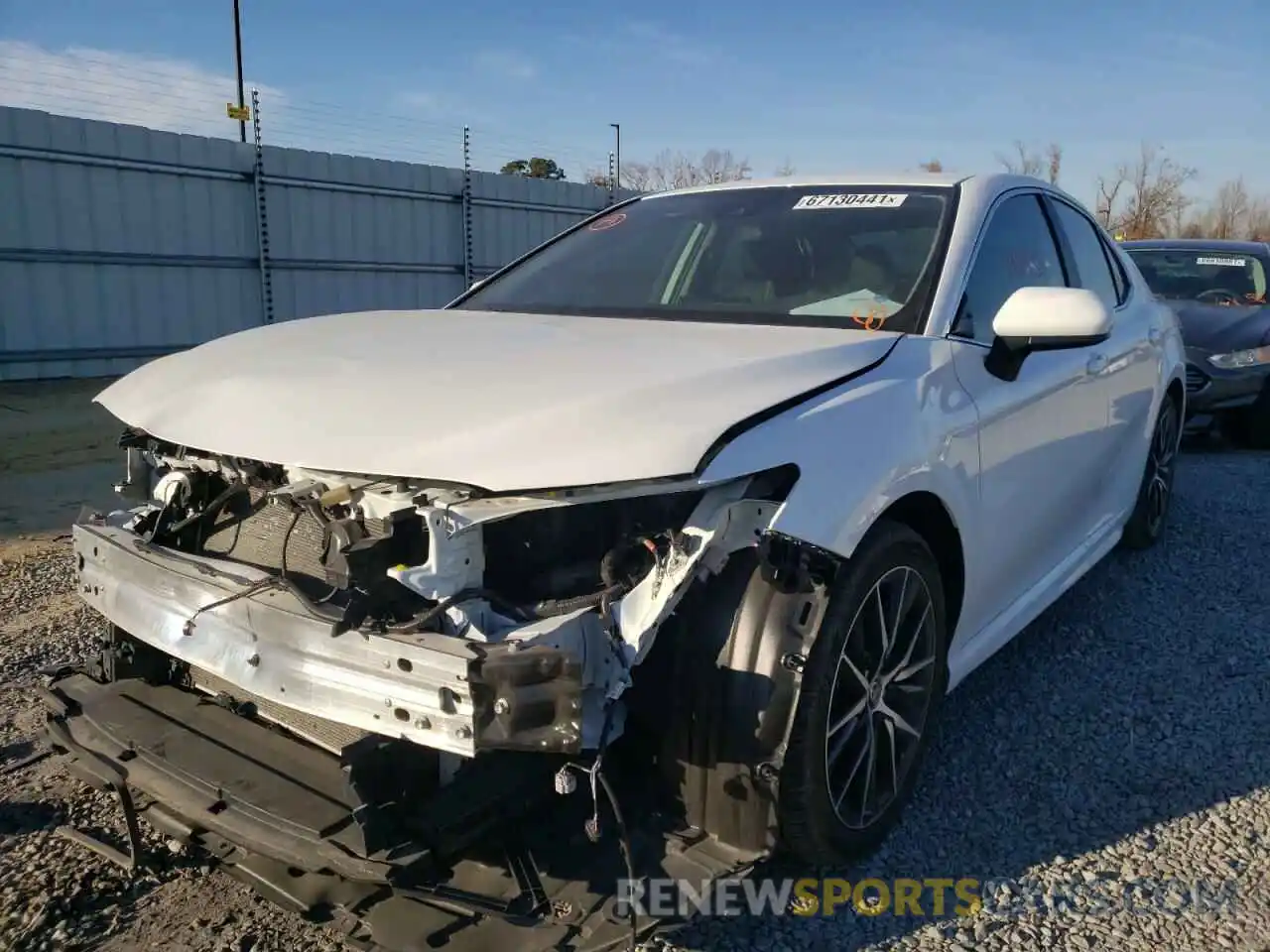 2 Photograph of a damaged car 4T1G11AKXMU402958 TOYOTA CAMRY 2021