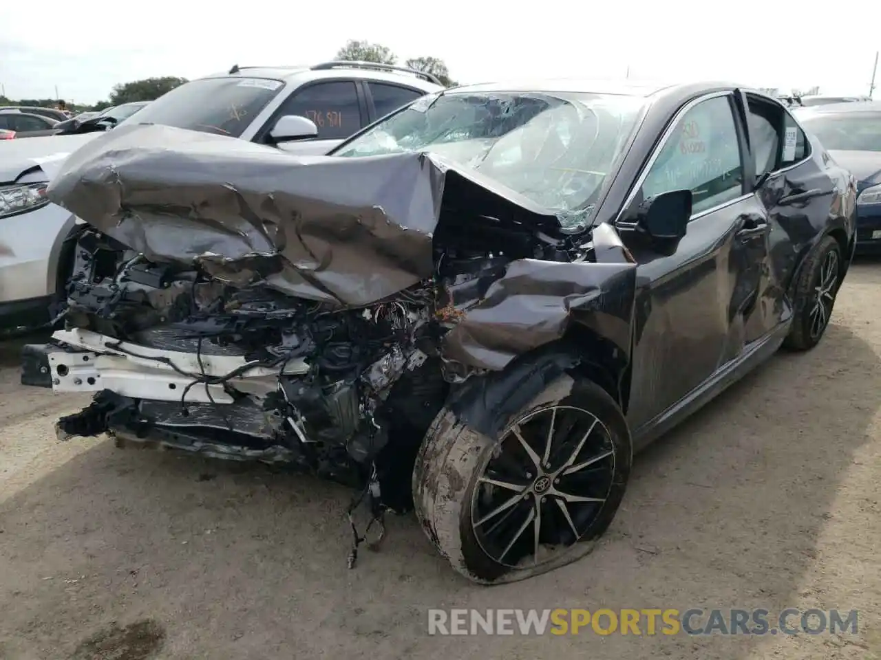 2 Photograph of a damaged car 4T1G11AKXMU404046 TOYOTA CAMRY 2021