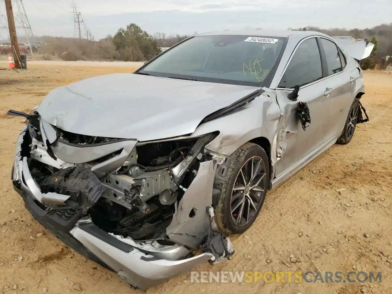 2 Photograph of a damaged car 4T1G11AKXMU406833 TOYOTA CAMRY 2021