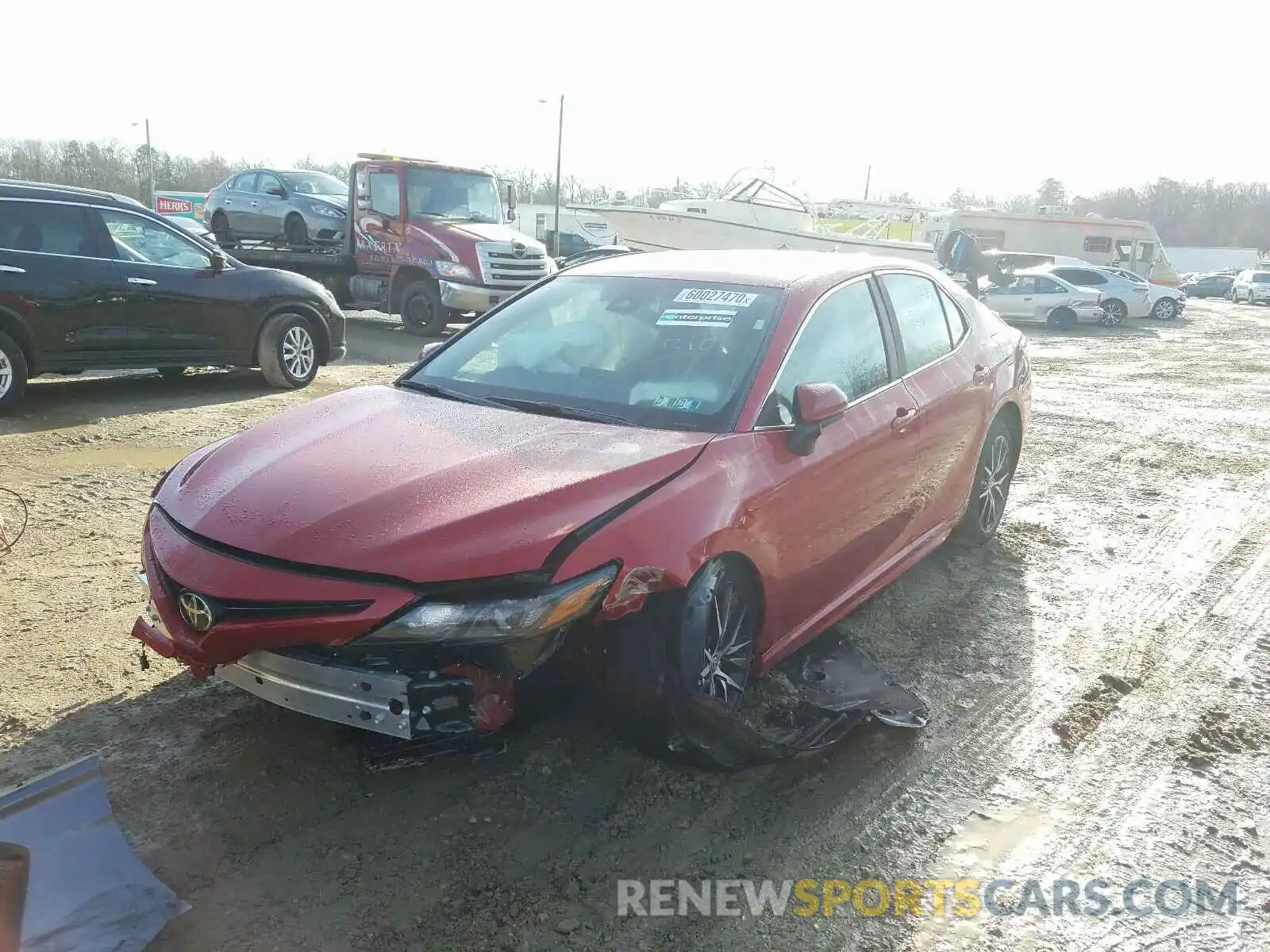 2 Photograph of a damaged car 4T1G11AKXMU410686 TOYOTA CAMRY 2021