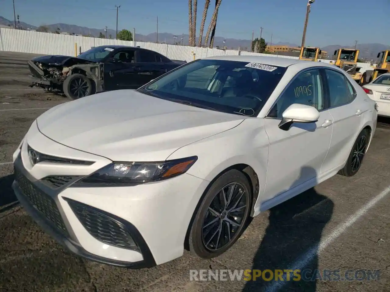 2 Photograph of a damaged car 4T1G11AKXMU413586 TOYOTA CAMRY 2021