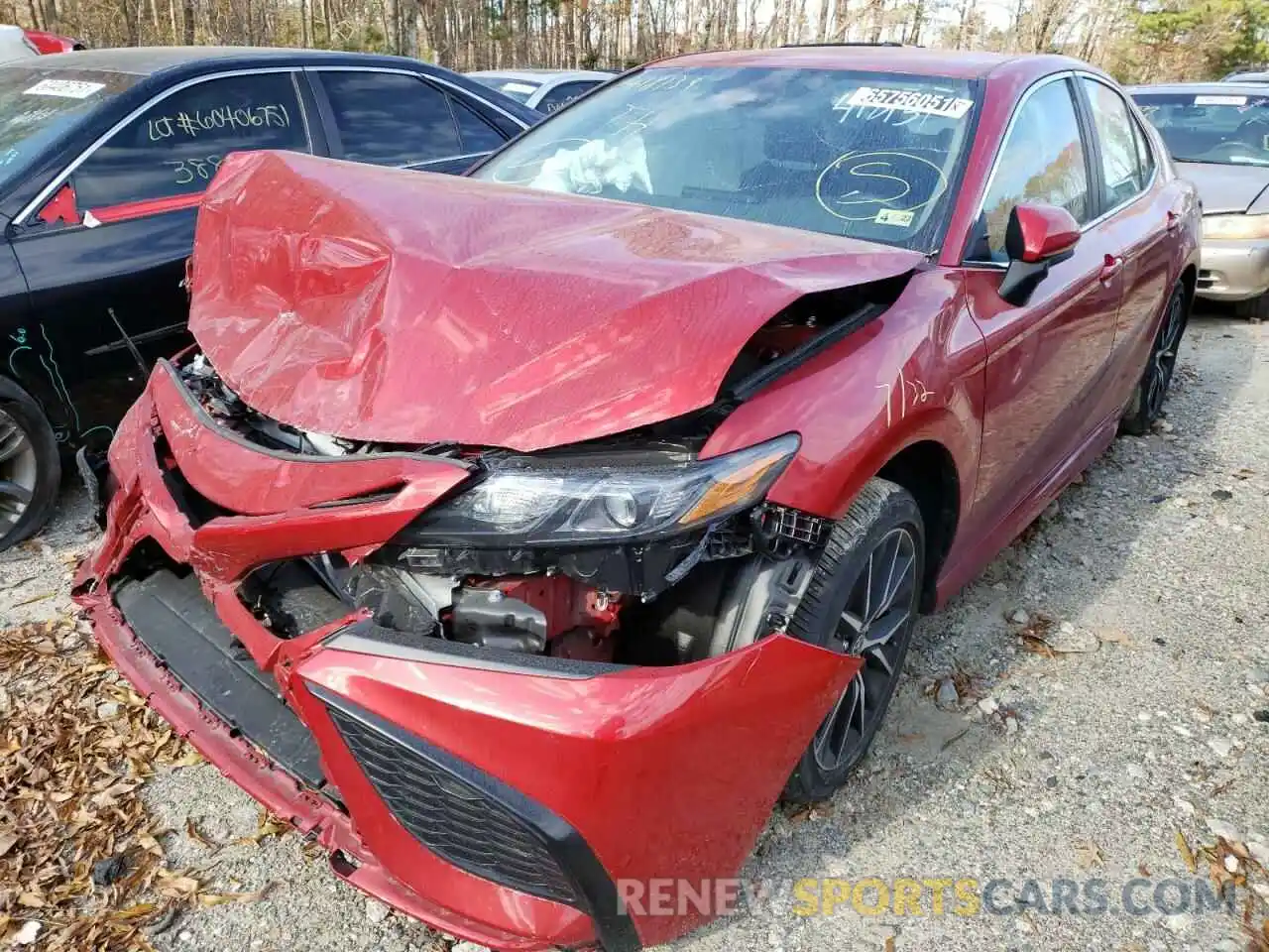 2 Photograph of a damaged car 4T1G11AKXMU418139 TOYOTA CAMRY 2021