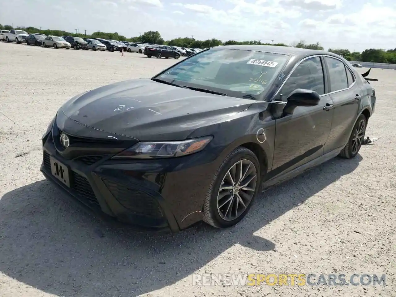 2 Photograph of a damaged car 4T1G11AKXMU420389 TOYOTA CAMRY 2021