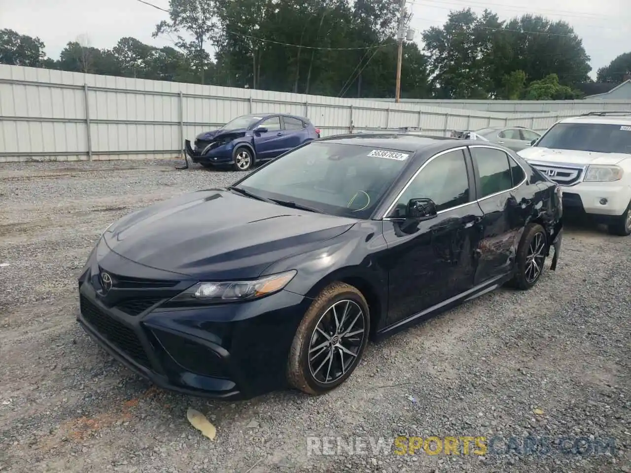 2 Photograph of a damaged car 4T1G11AKXMU421171 TOYOTA CAMRY 2021