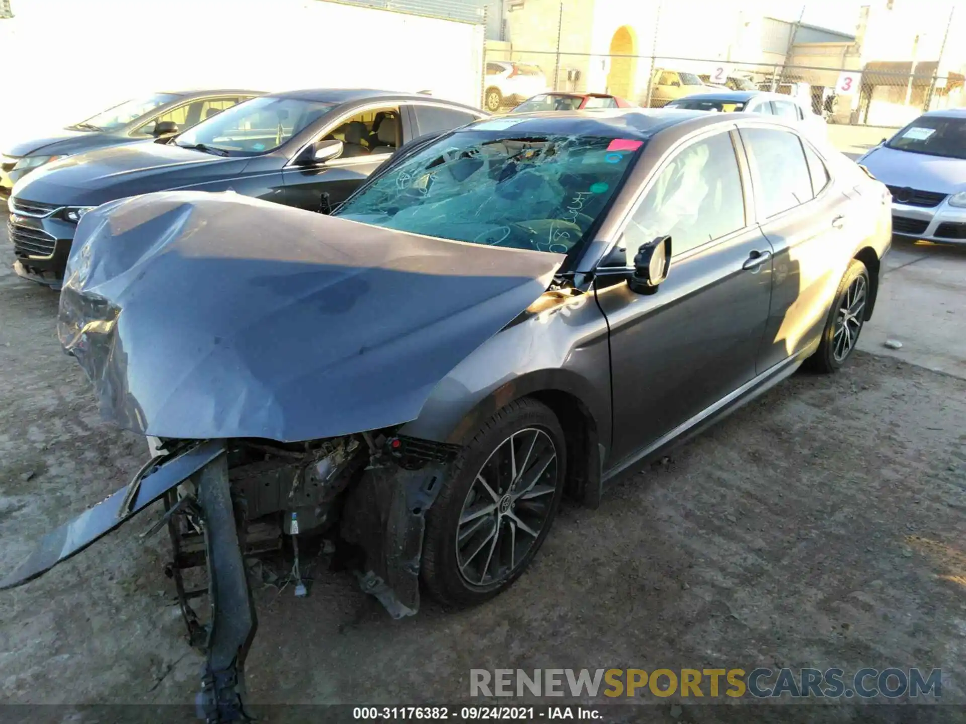 2 Photograph of a damaged car 4T1G11AKXMU422448 TOYOTA CAMRY 2021