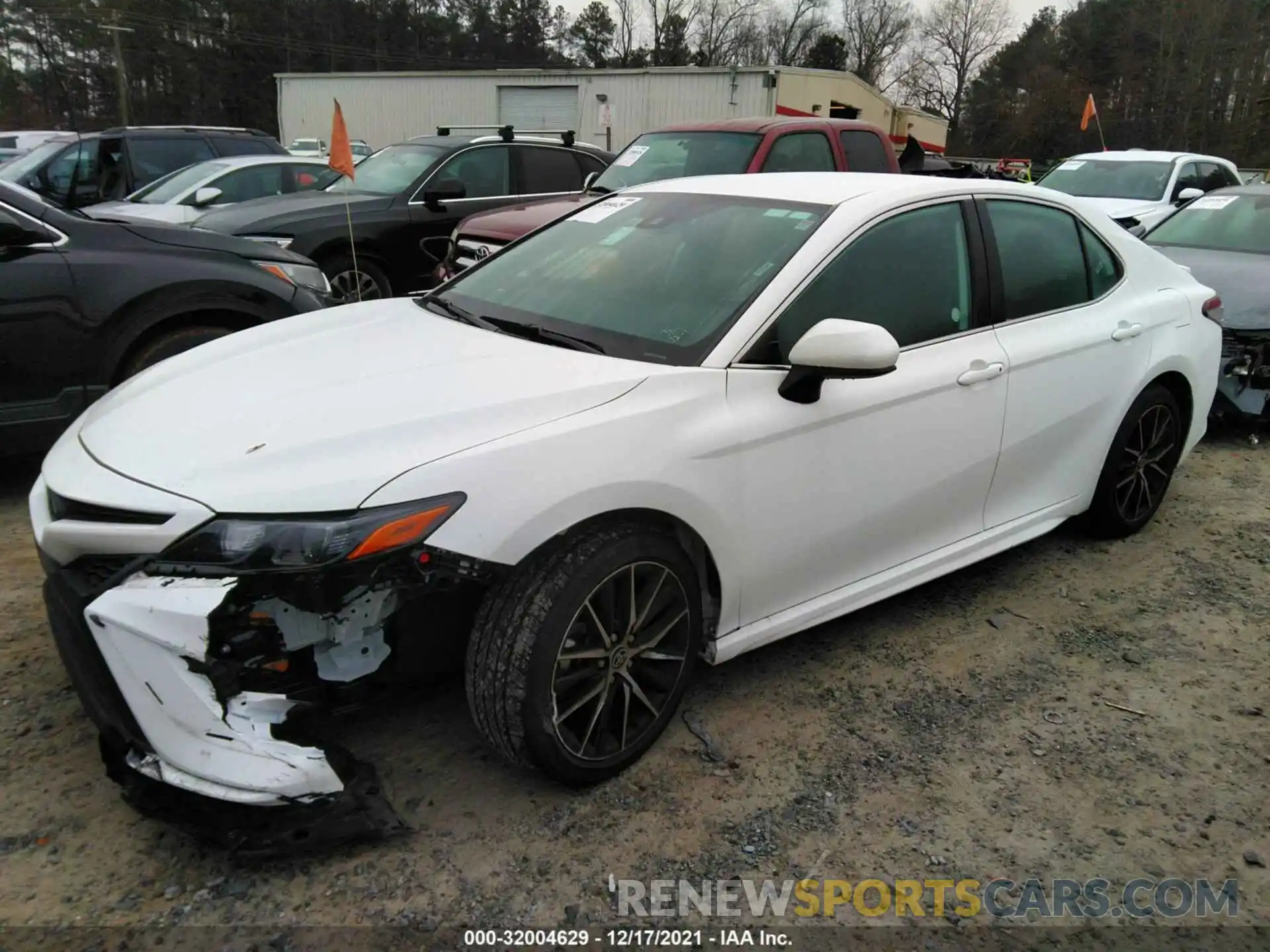 2 Photograph of a damaged car 4T1G11AKXMU438665 TOYOTA CAMRY 2021