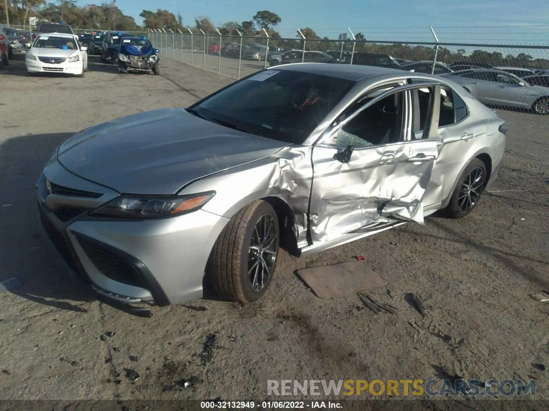 2 Photograph of a damaged car 4T1G11AKXMU439881 TOYOTA CAMRY 2021