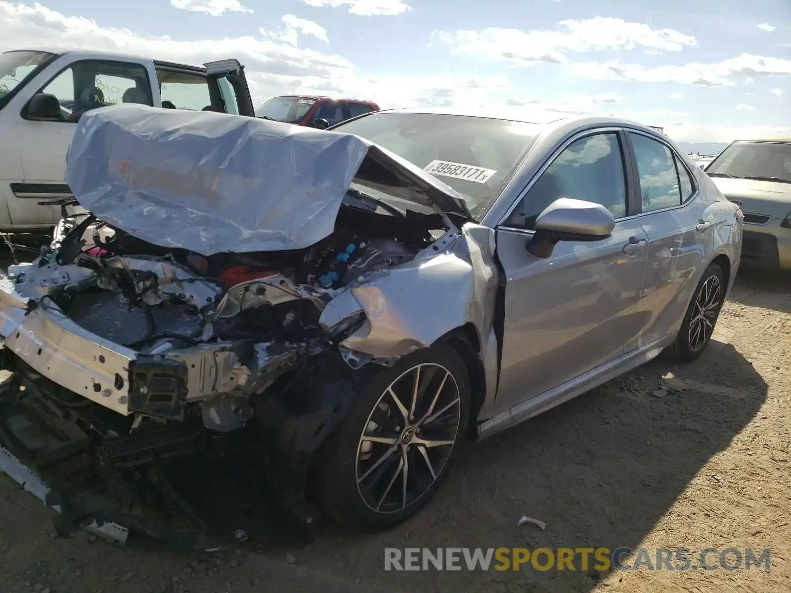 2 Photograph of a damaged car 4T1G11AKXMU443817 TOYOTA CAMRY 2021