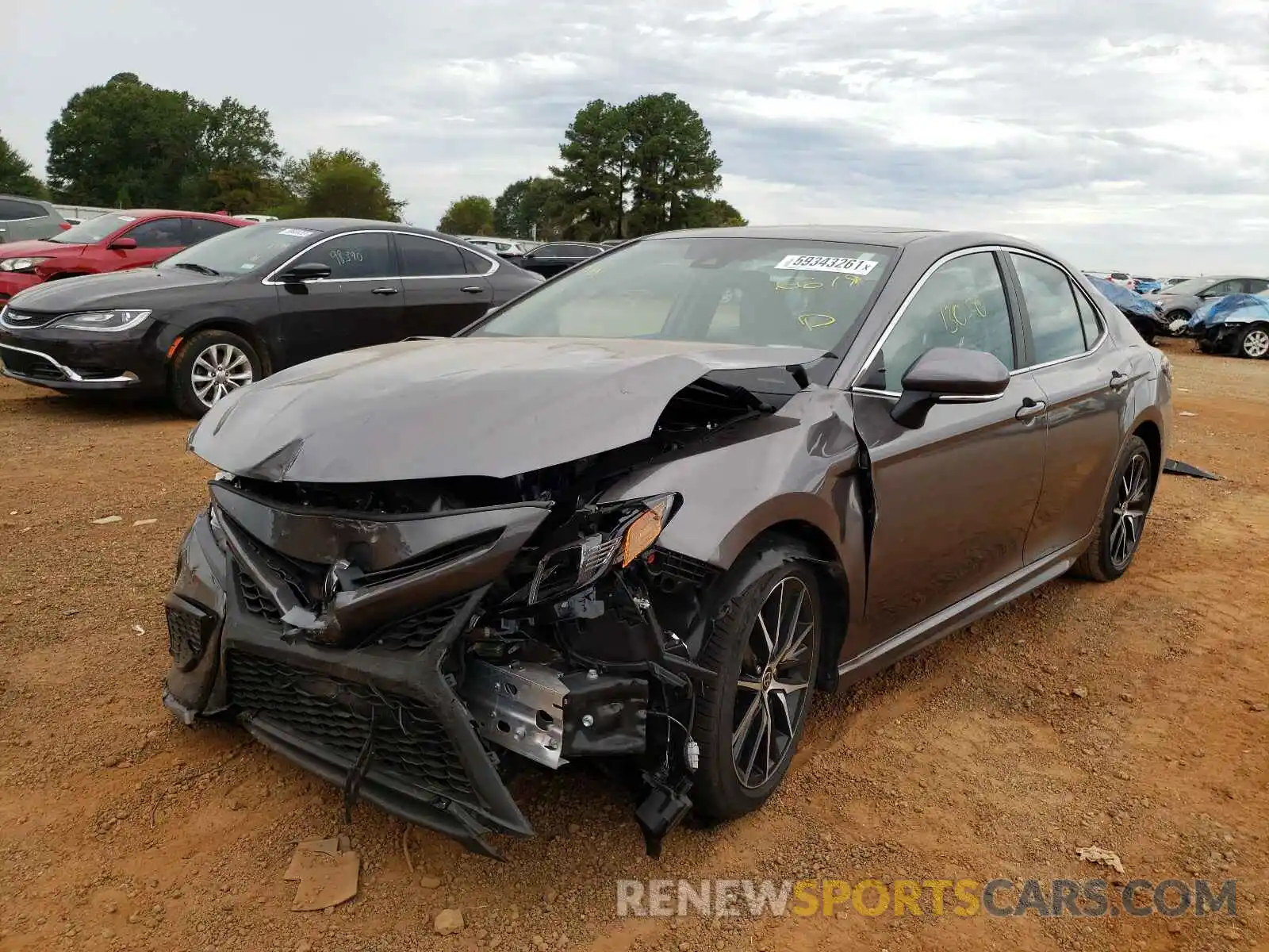 2 Photograph of a damaged car 4T1G11AKXMU446619 TOYOTA CAMRY 2021