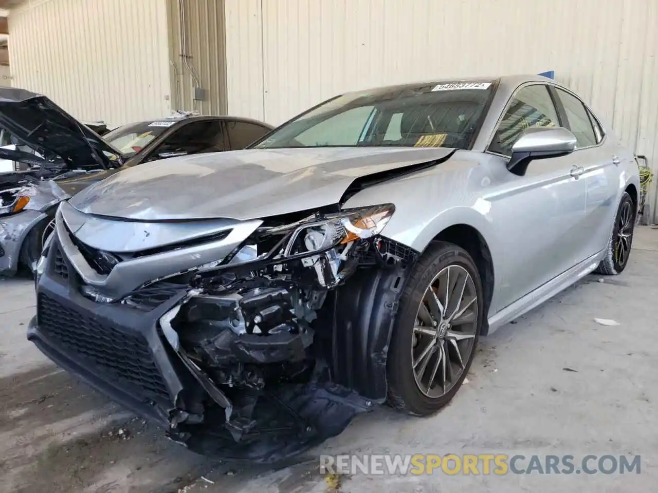 2 Photograph of a damaged car 4T1G11AKXMU450931 TOYOTA CAMRY 2021