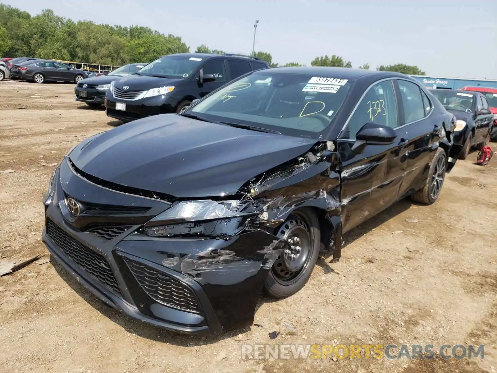 2 Photograph of a damaged car 4T1G11AKXMU454266 TOYOTA CAMRY 2021