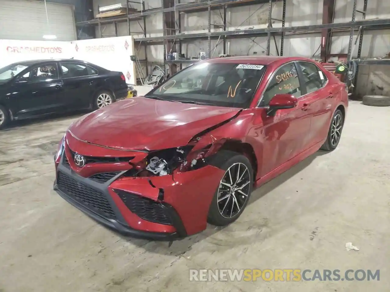 2 Photograph of a damaged car 4T1G11AKXMU455238 TOYOTA CAMRY 2021