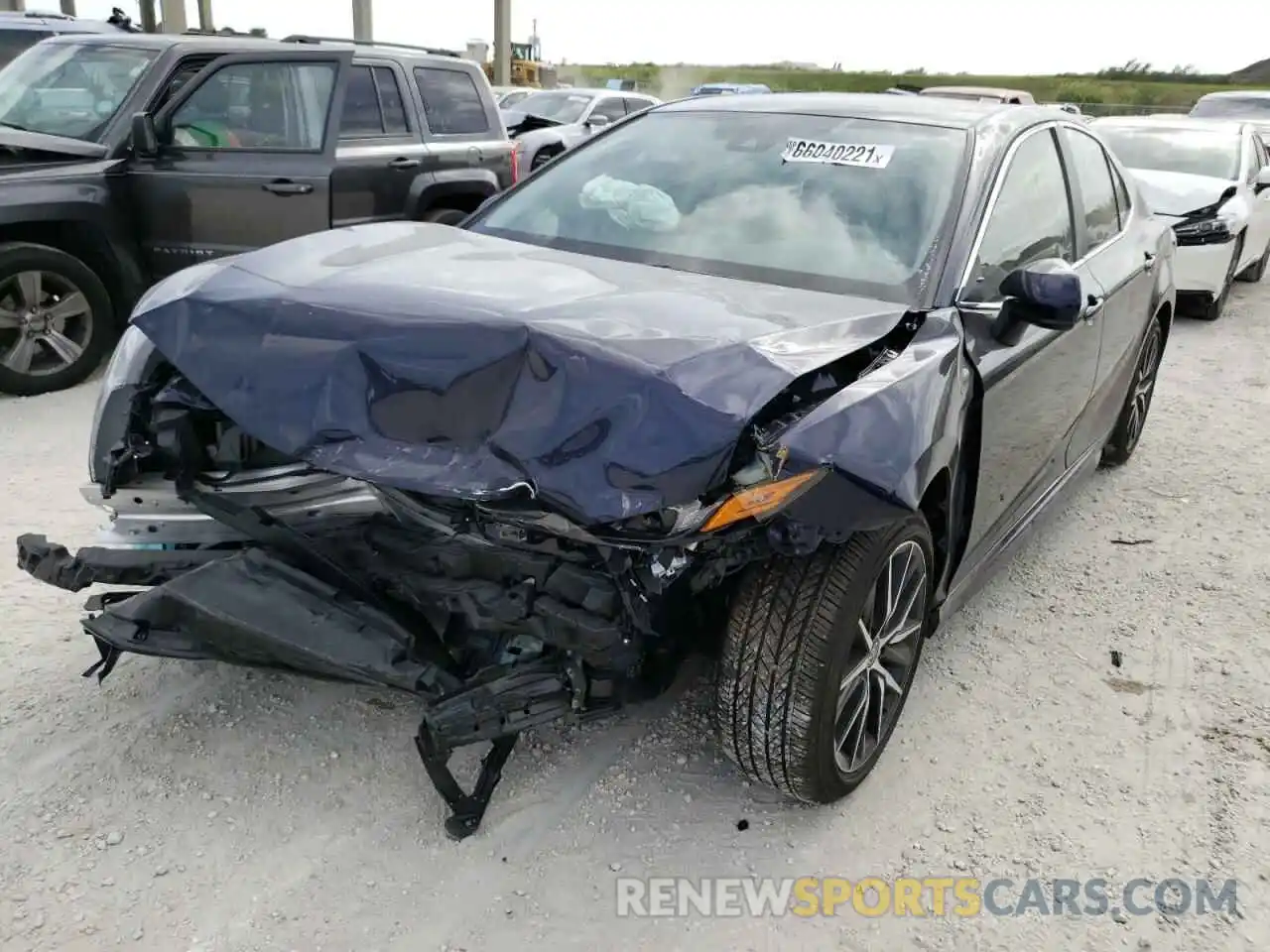 2 Photograph of a damaged car 4T1G11AKXMU457586 TOYOTA CAMRY 2021