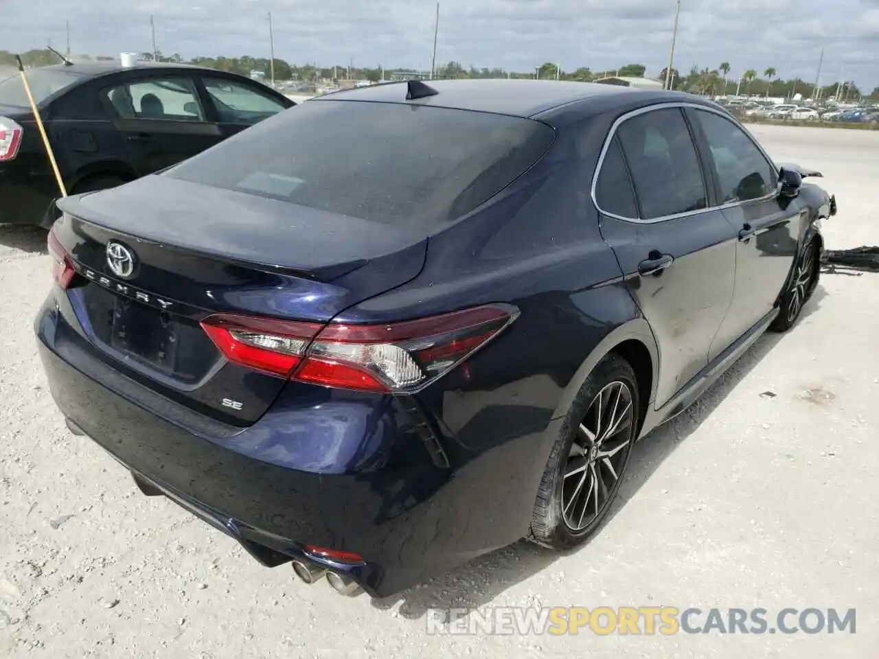 4 Photograph of a damaged car 4T1G11AKXMU457586 TOYOTA CAMRY 2021