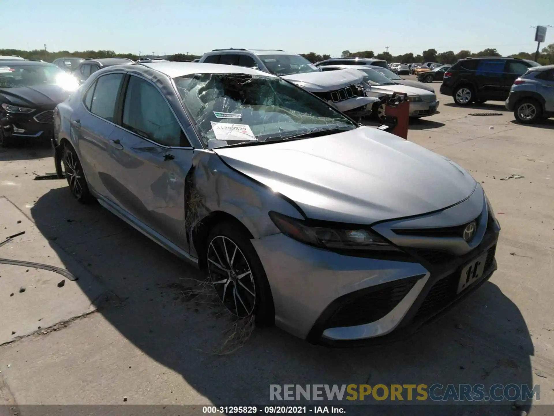 1 Photograph of a damaged car 4T1G11AKXMU467793 TOYOTA CAMRY 2021