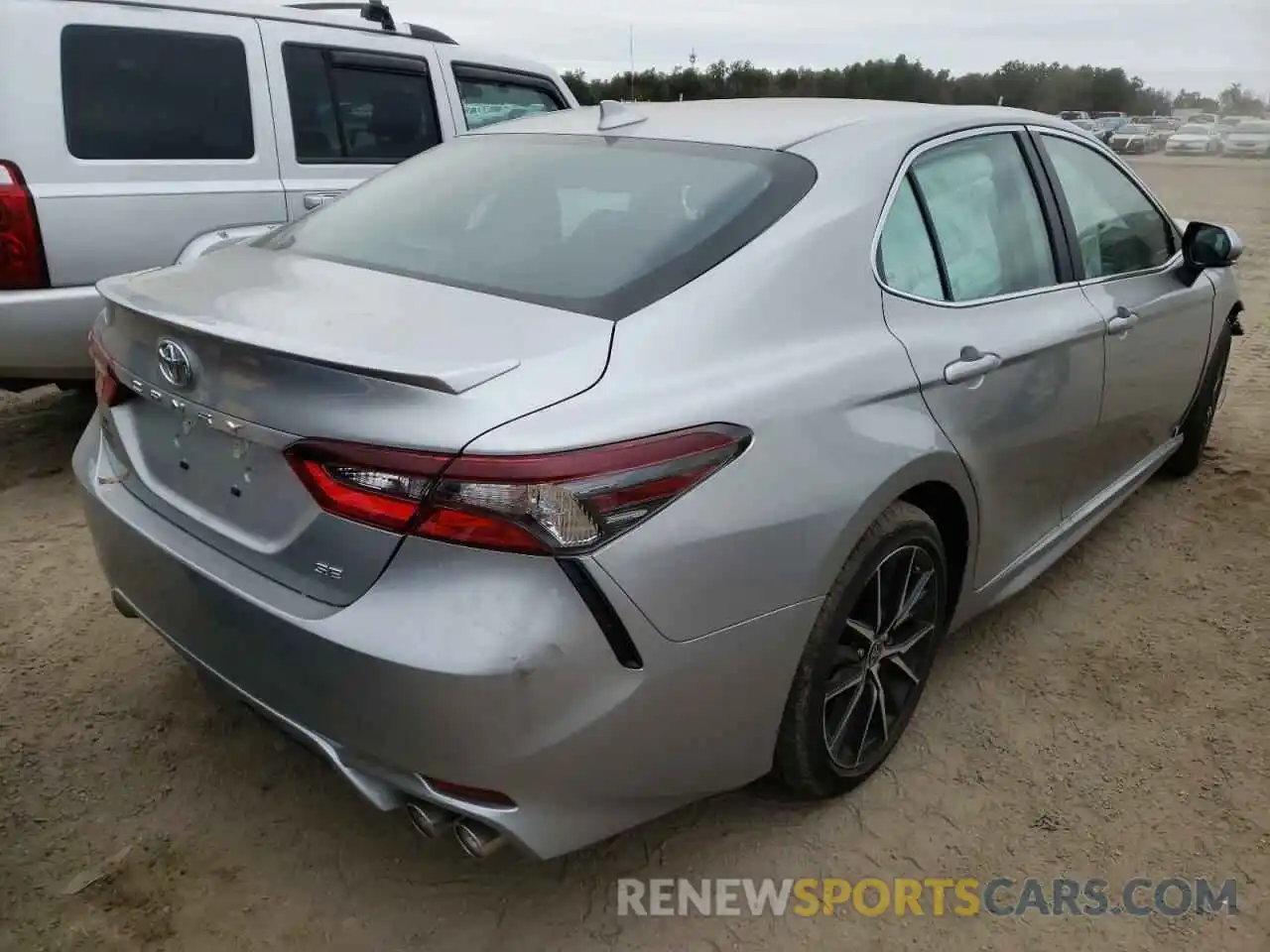 4 Photograph of a damaged car 4T1G11AKXMU482133 TOYOTA CAMRY 2021