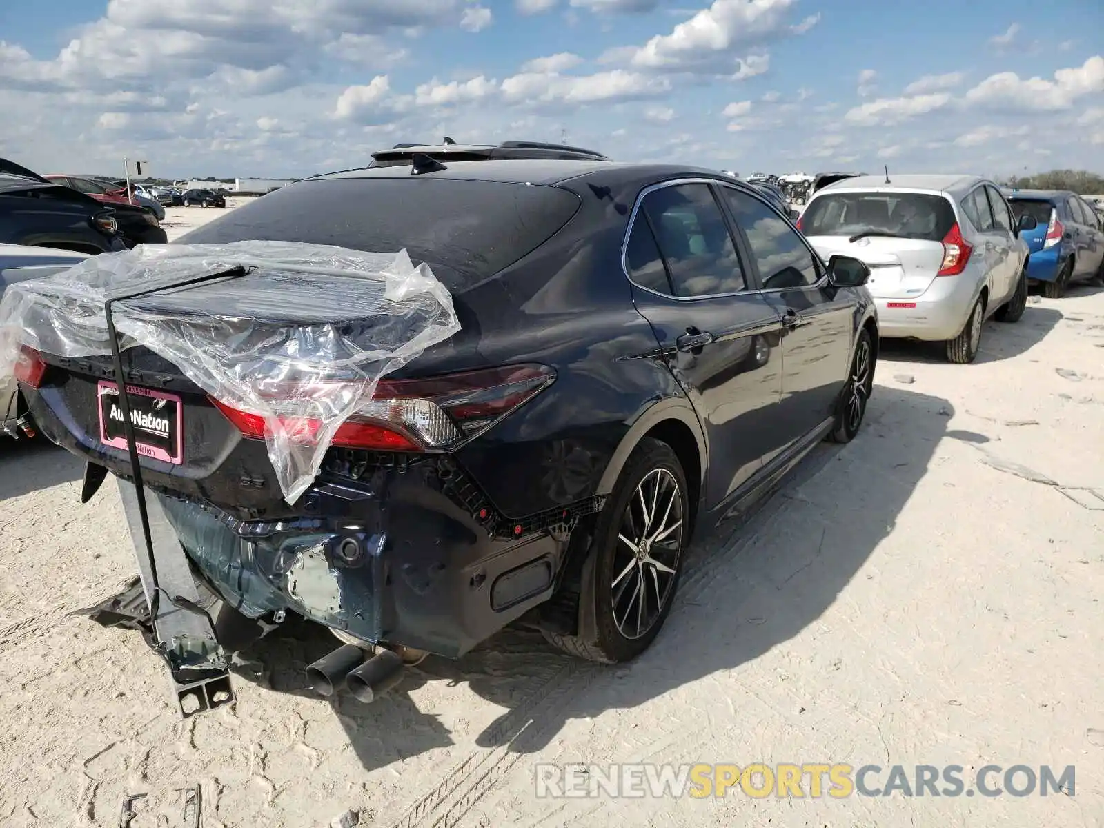 4 Photograph of a damaged car 4T1G11AKXMU486649 TOYOTA CAMRY 2021