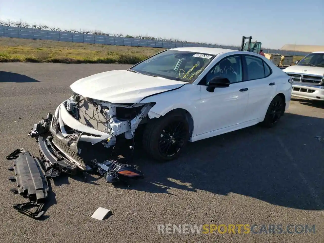 2 Photograph of a damaged car 4T1G11AKXMU494704 TOYOTA CAMRY 2021