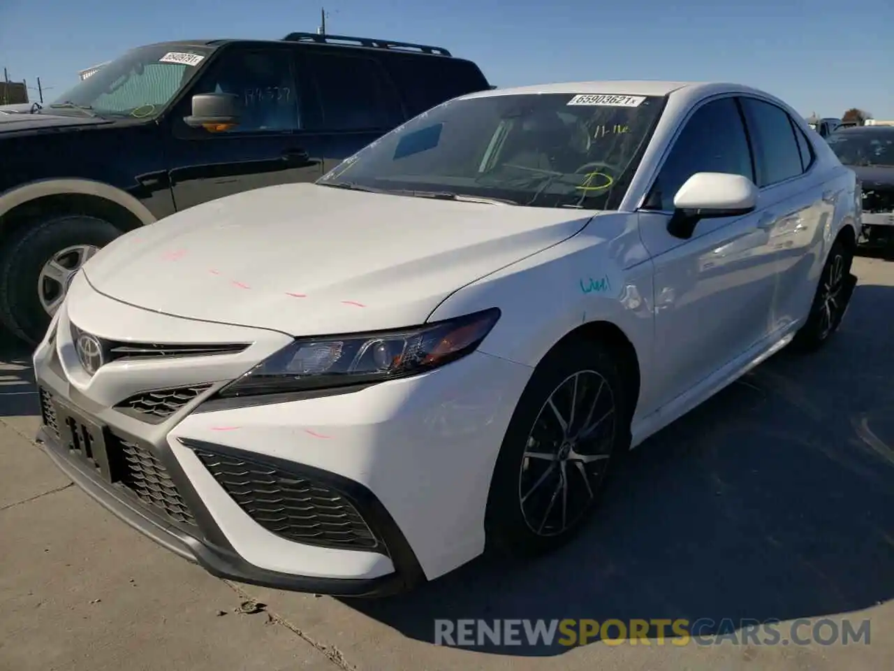 2 Photograph of a damaged car 4T1G11AKXMU497375 TOYOTA CAMRY 2021