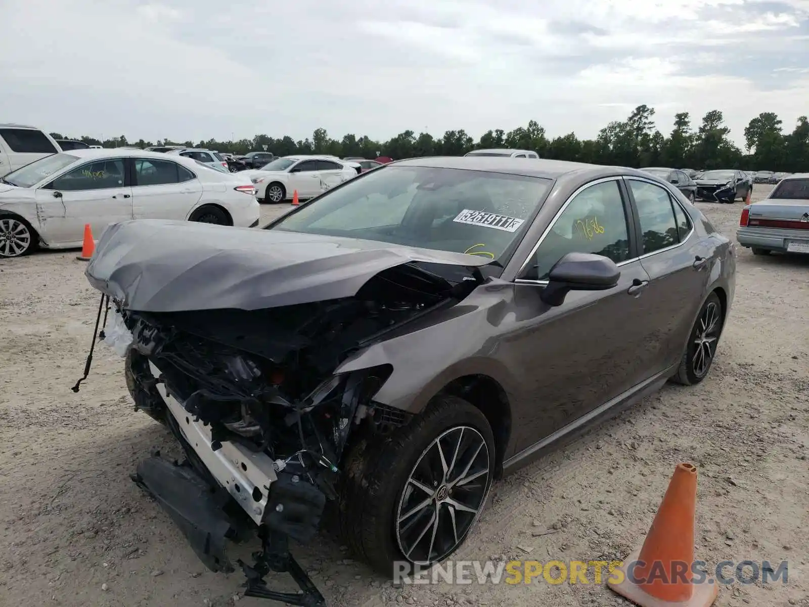 2 Photograph of a damaged car 4T1G11AKXMU516314 TOYOTA CAMRY 2021