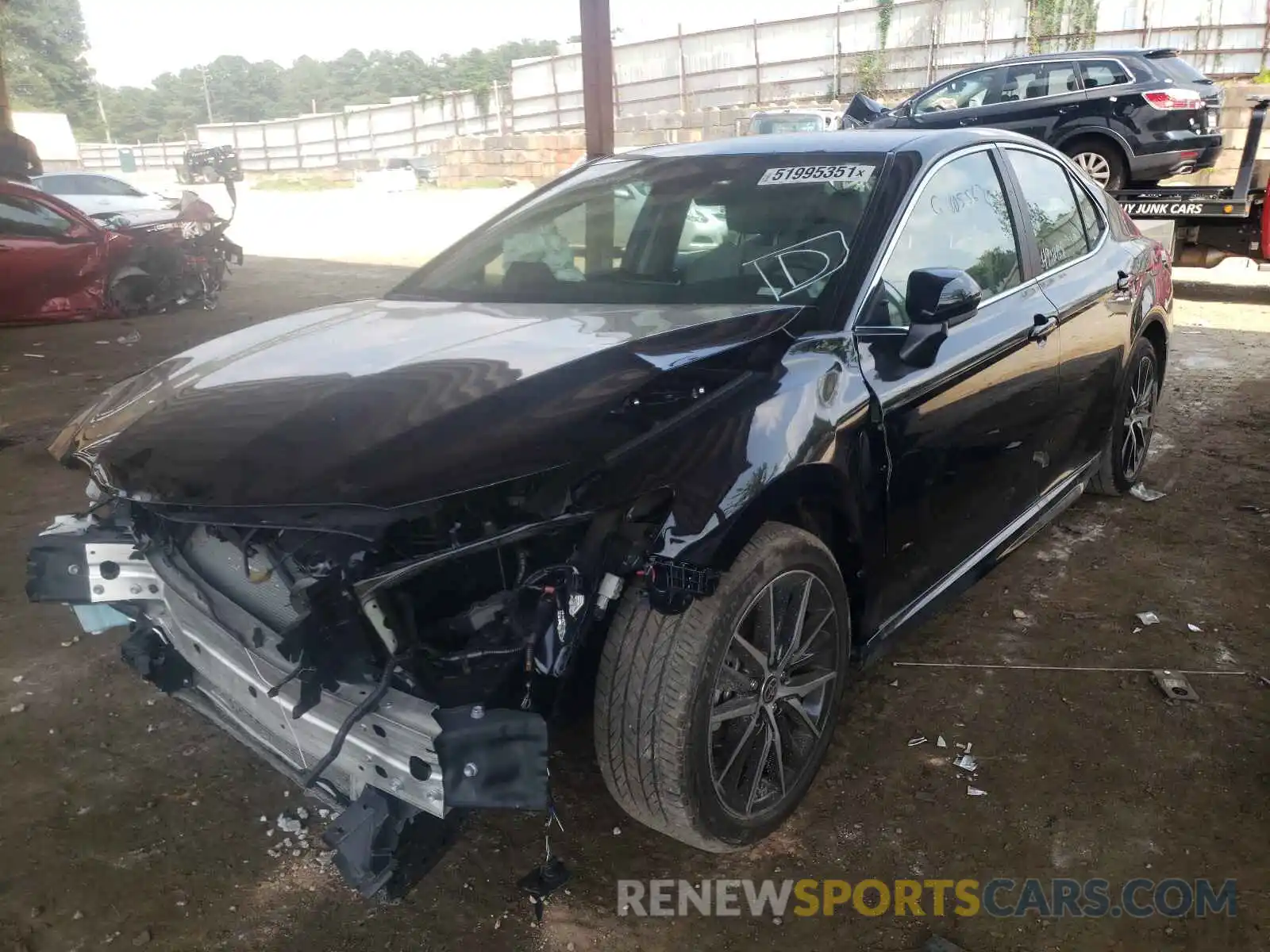 2 Photograph of a damaged car 4T1G11AKXMU517737 TOYOTA CAMRY 2021