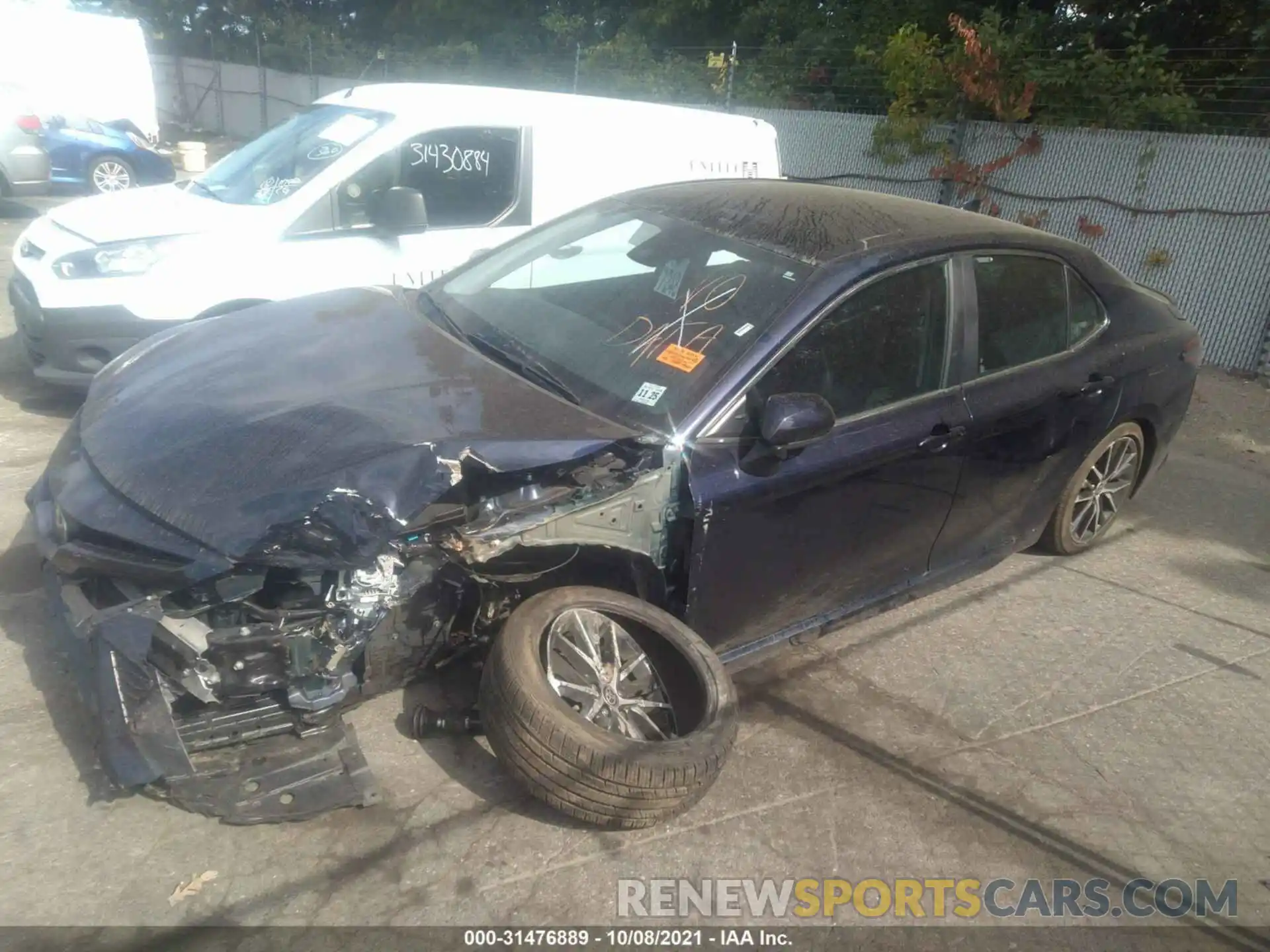 2 Photograph of a damaged car 4T1G11AKXMU520606 TOYOTA CAMRY 2021