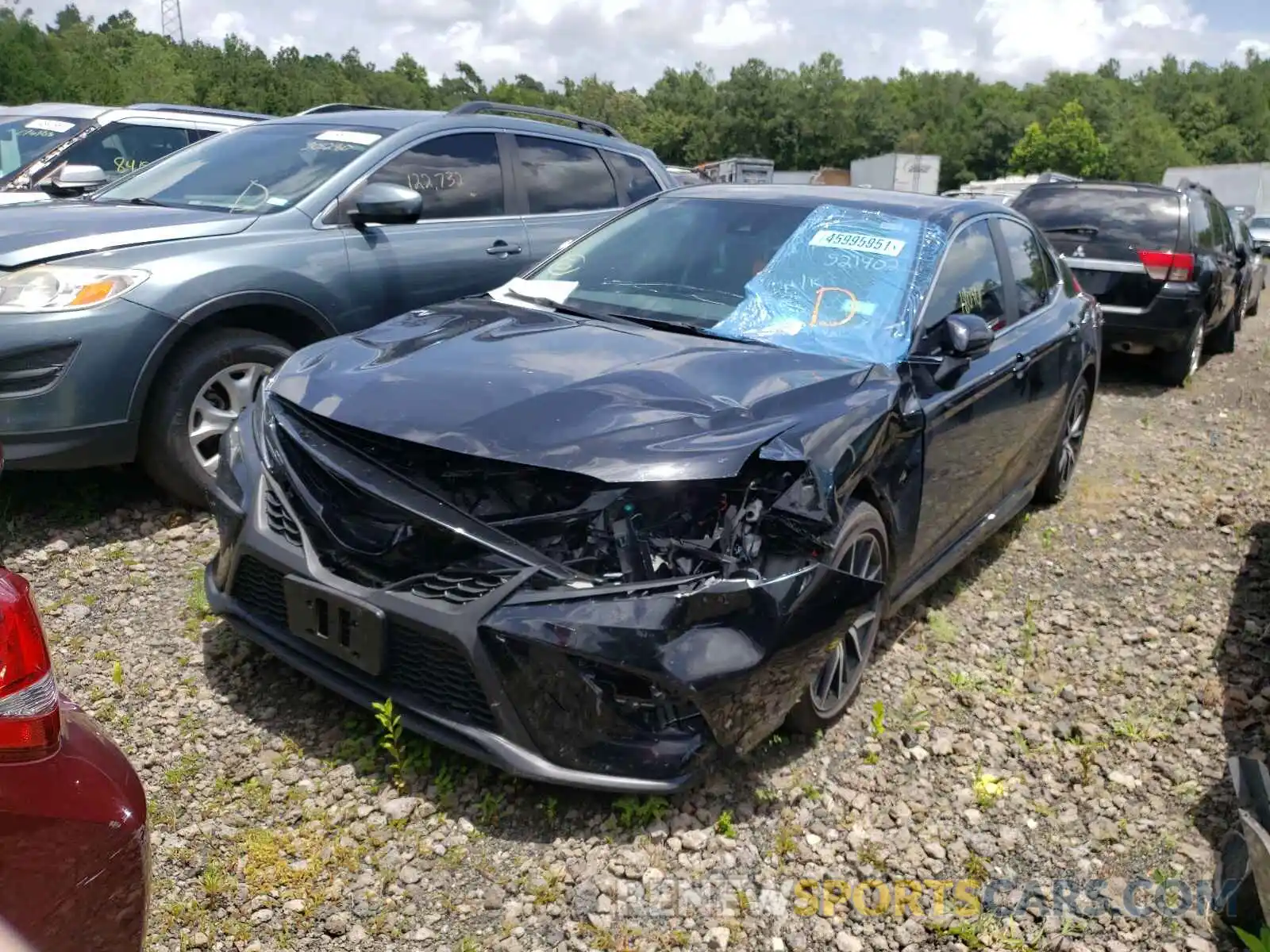 2 Photograph of a damaged car 4T1G11AKXMU521402 TOYOTA CAMRY 2021