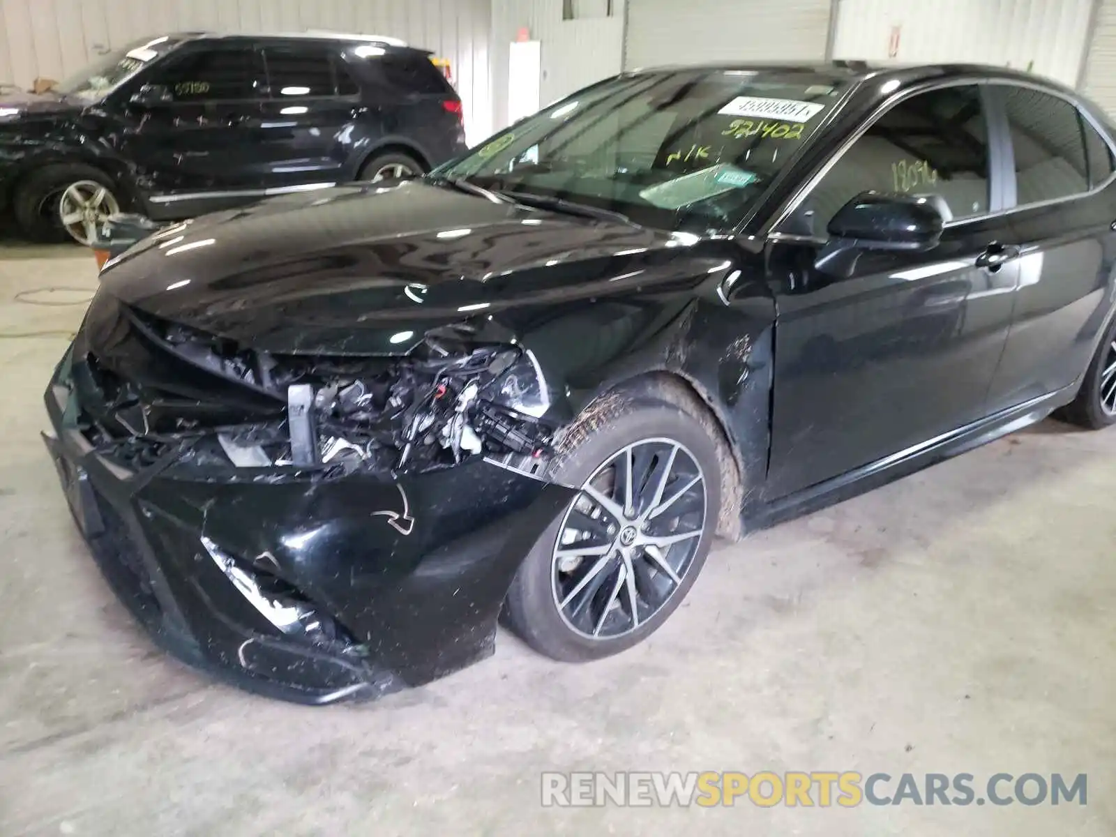 9 Photograph of a damaged car 4T1G11AKXMU521402 TOYOTA CAMRY 2021