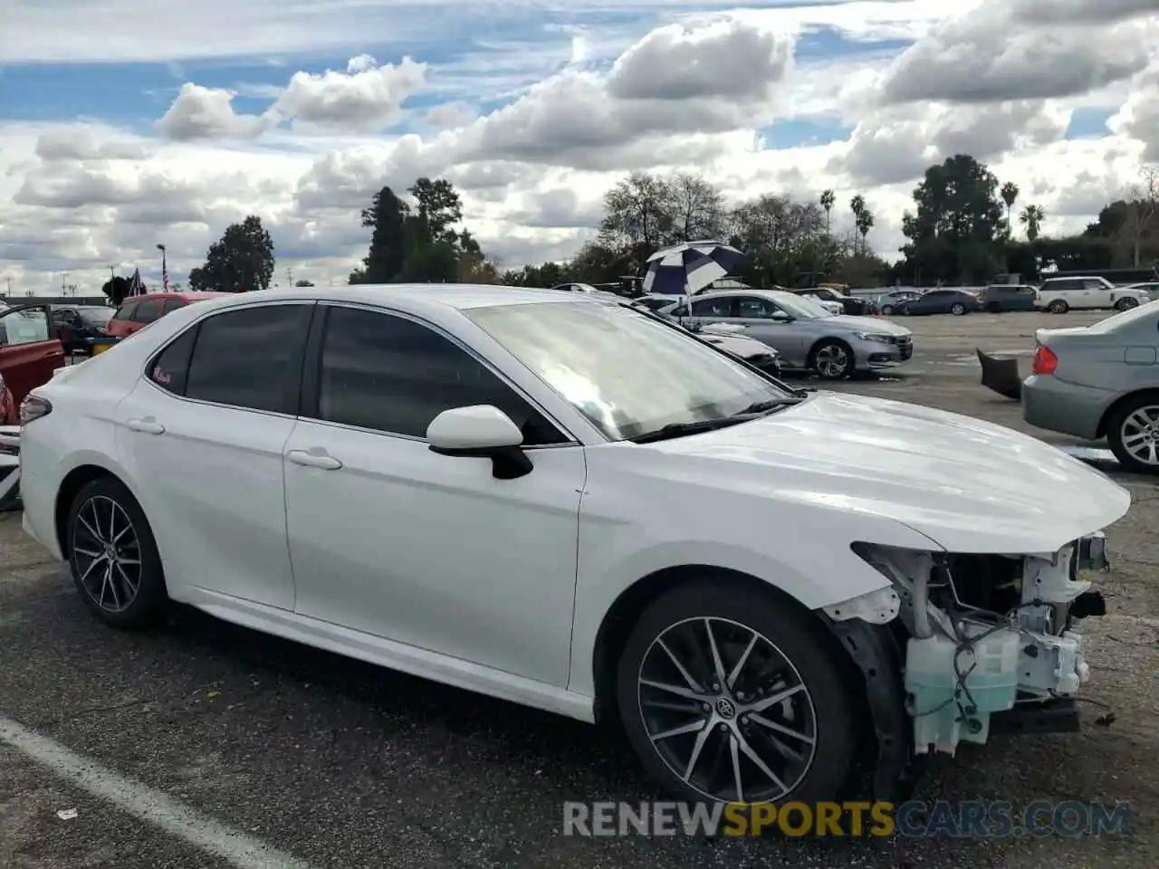 4 Photograph of a damaged car 4T1G11AKXMU522713 TOYOTA CAMRY 2021