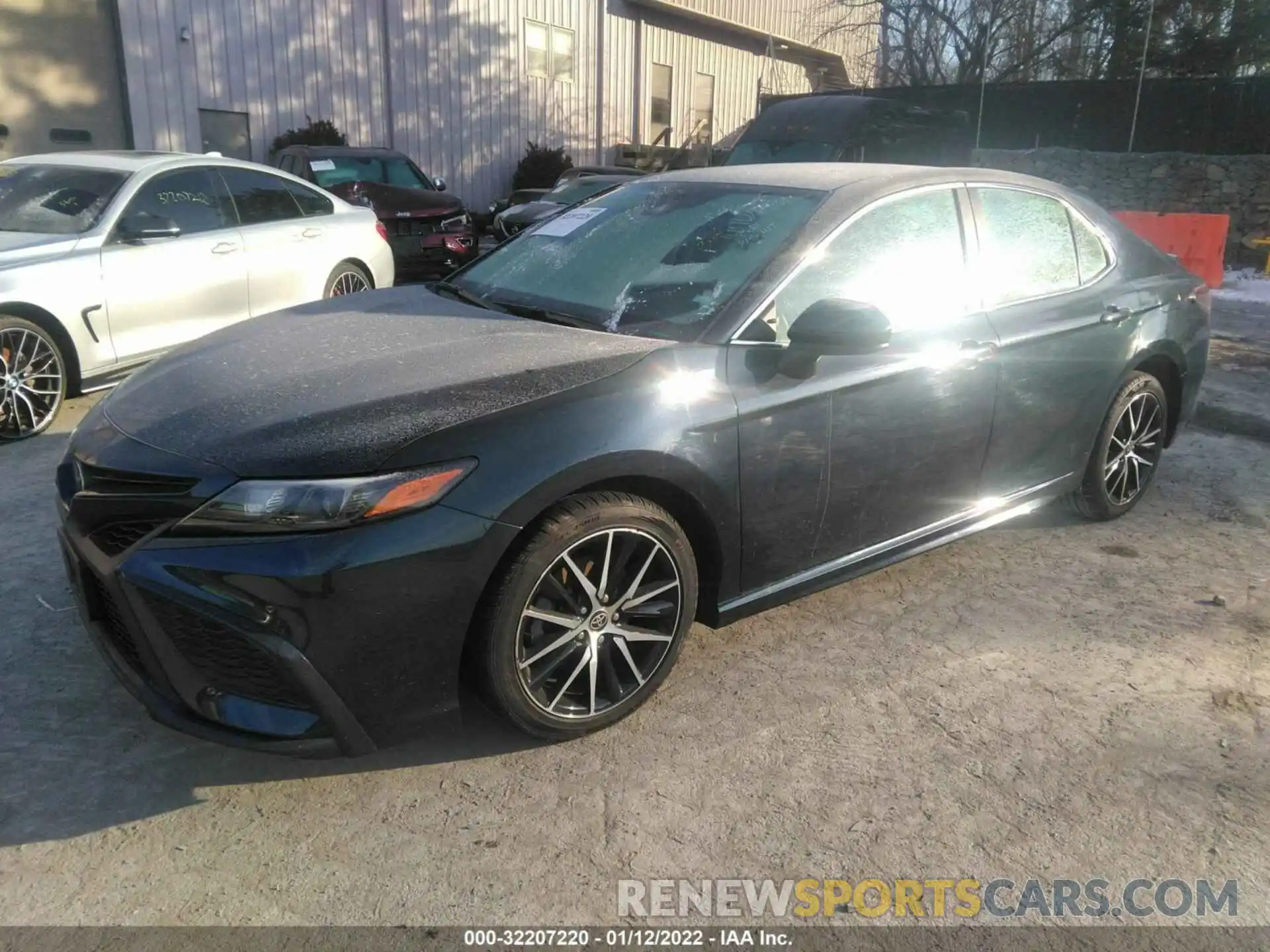 2 Photograph of a damaged car 4T1G11AKXMU523876 TOYOTA CAMRY 2021