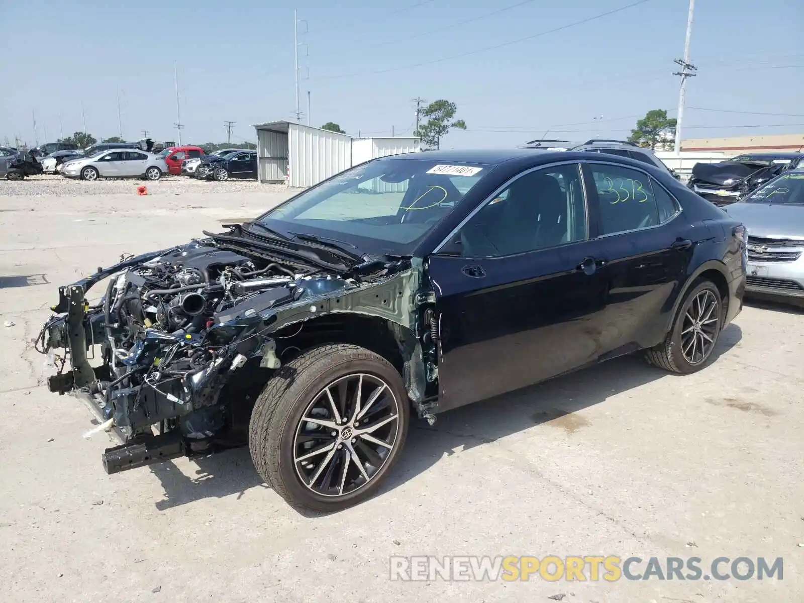 2 Photograph of a damaged car 4T1G11AKXMU524736 TOYOTA CAMRY 2021