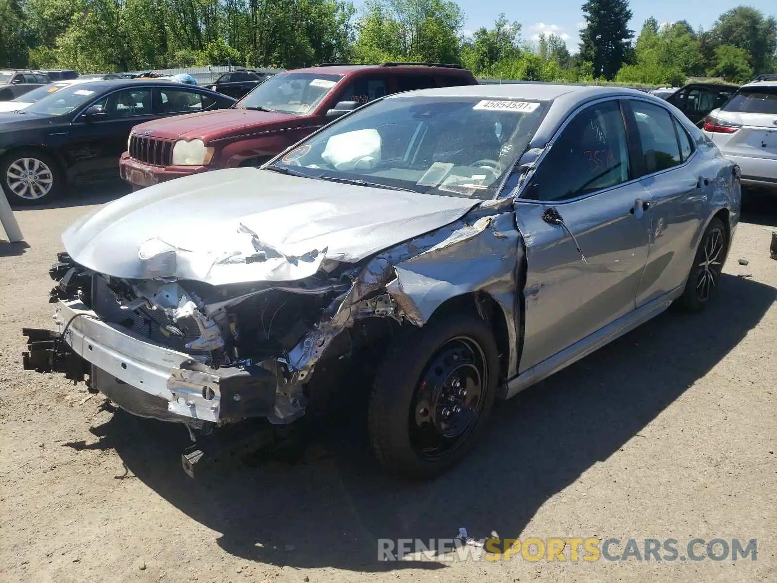 2 Photograph of a damaged car 4T1G11AKXMU525014 TOYOTA CAMRY 2021