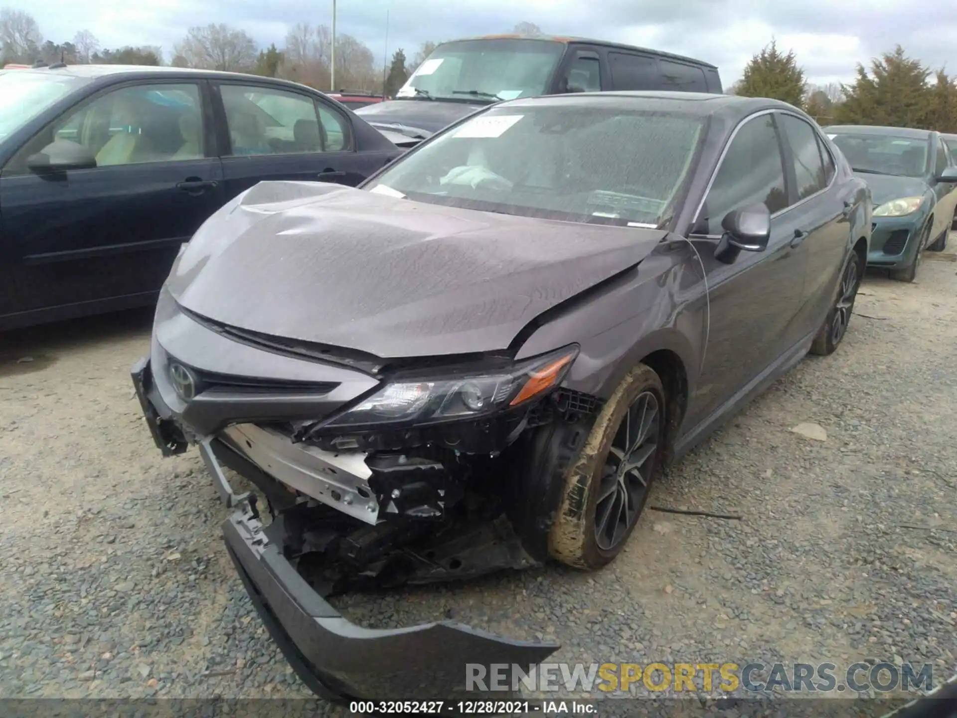 2 Photograph of a damaged car 4T1G11AKXMU527667 TOYOTA CAMRY 2021