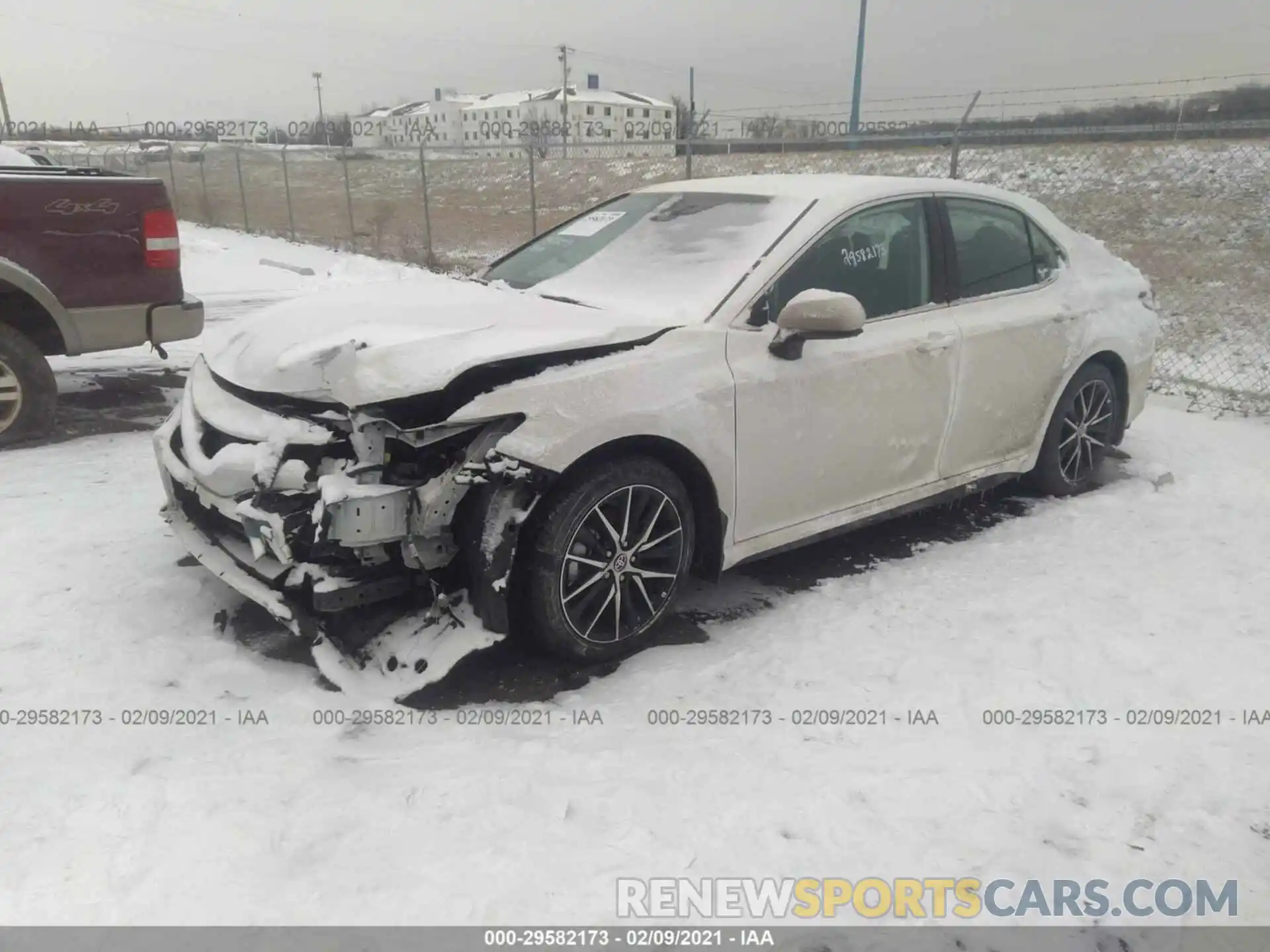 2 Photograph of a damaged car 4T1G11AKXMU535879 TOYOTA CAMRY 2021