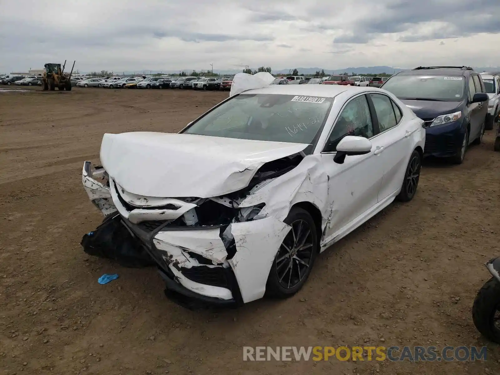 2 Photograph of a damaged car 4T1G11AKXMU542282 TOYOTA CAMRY 2021