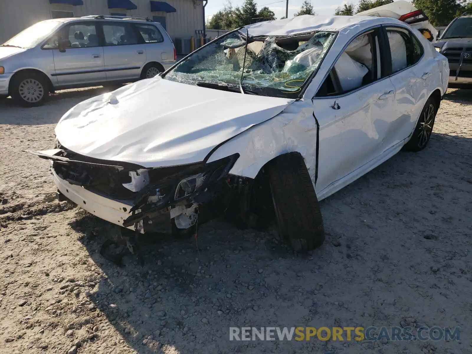 2 Photograph of a damaged car 4T1G11AKXMU556537 TOYOTA CAMRY 2021