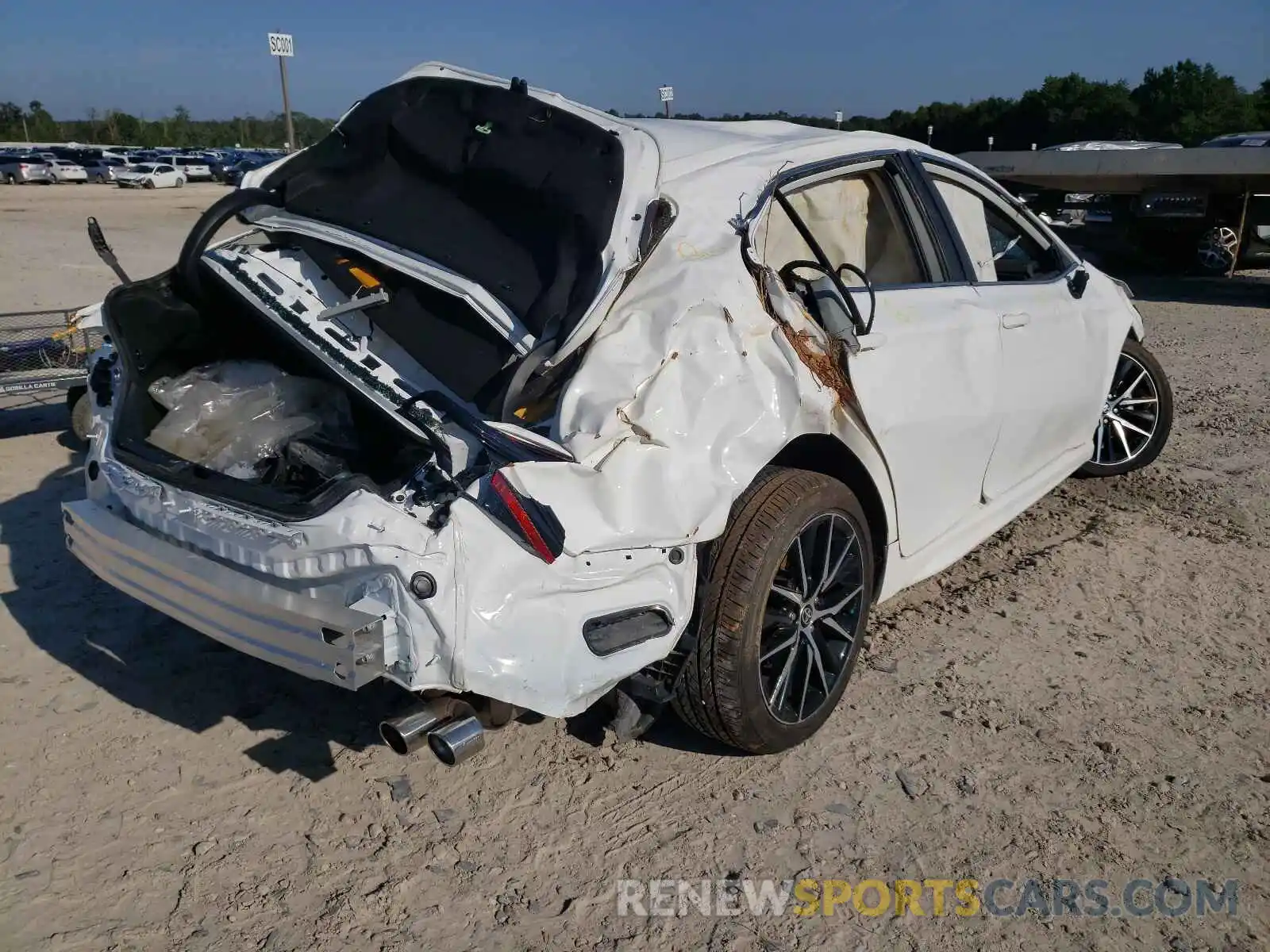 4 Photograph of a damaged car 4T1G11AKXMU556537 TOYOTA CAMRY 2021