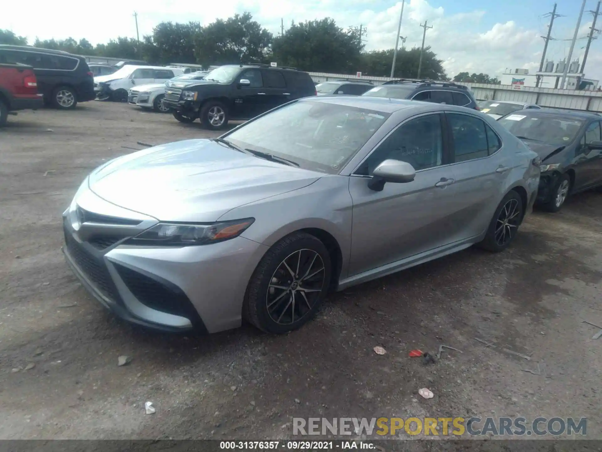 2 Photograph of a damaged car 4T1G11AKXMU557705 TOYOTA CAMRY 2021