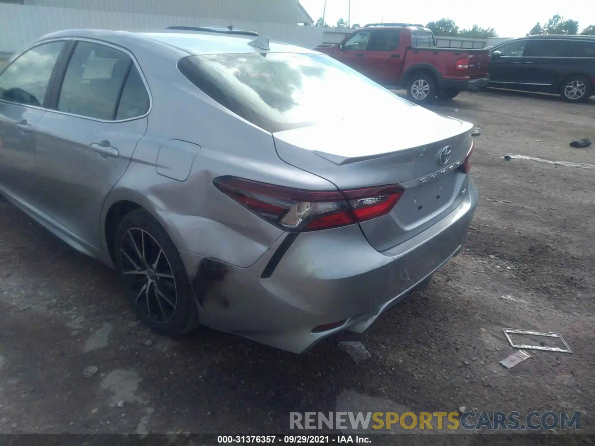 6 Photograph of a damaged car 4T1G11AKXMU557705 TOYOTA CAMRY 2021